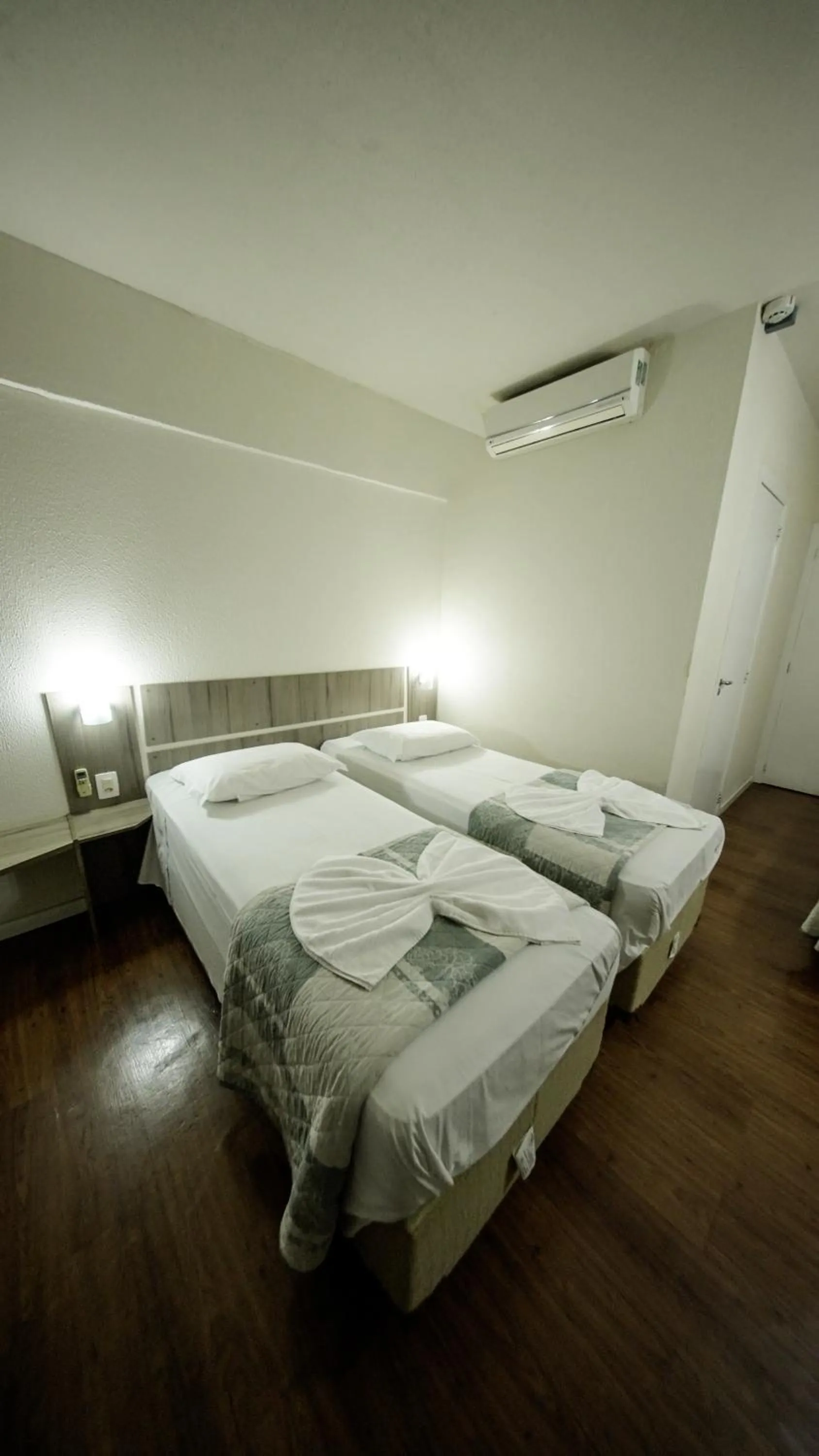 Bed in LH Plaza Hotel