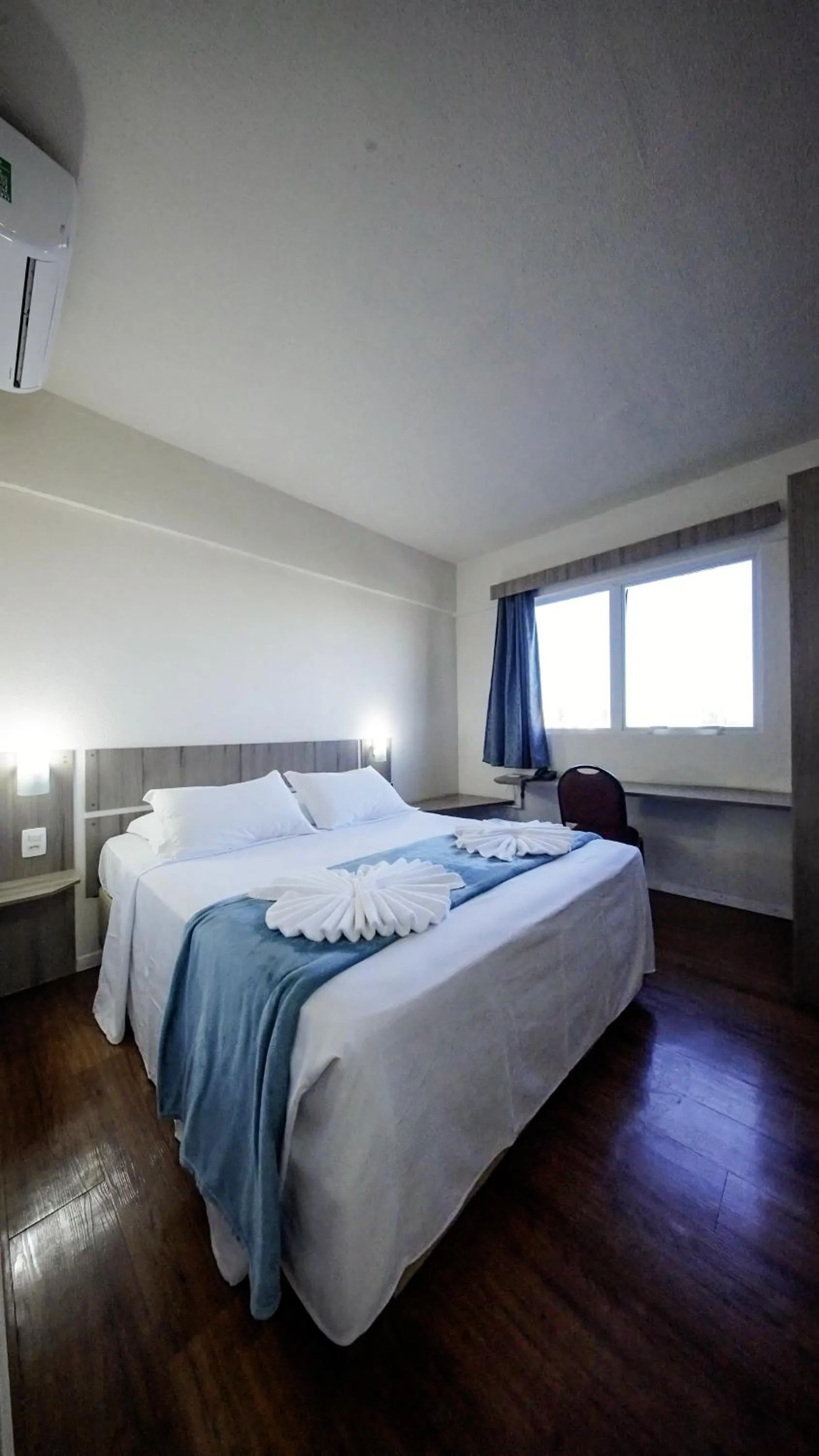 Toilet, Bed in LH Plaza Hotel