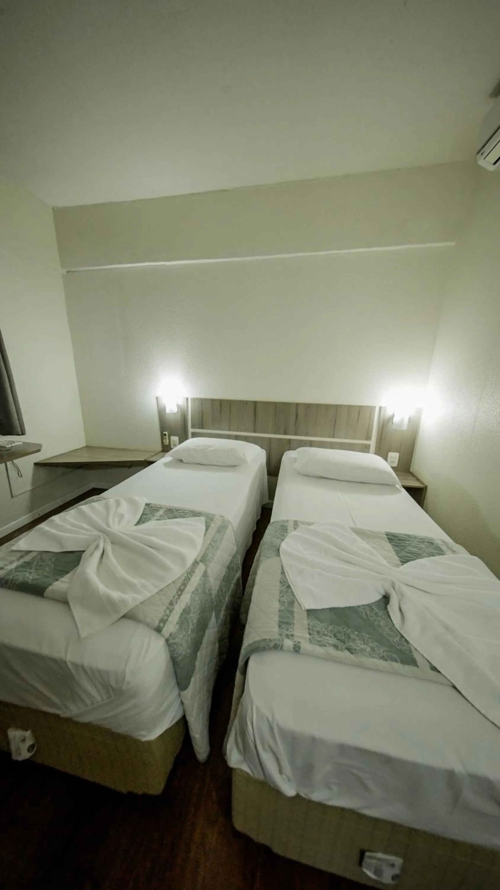 Bed in LH Plaza Hotel
