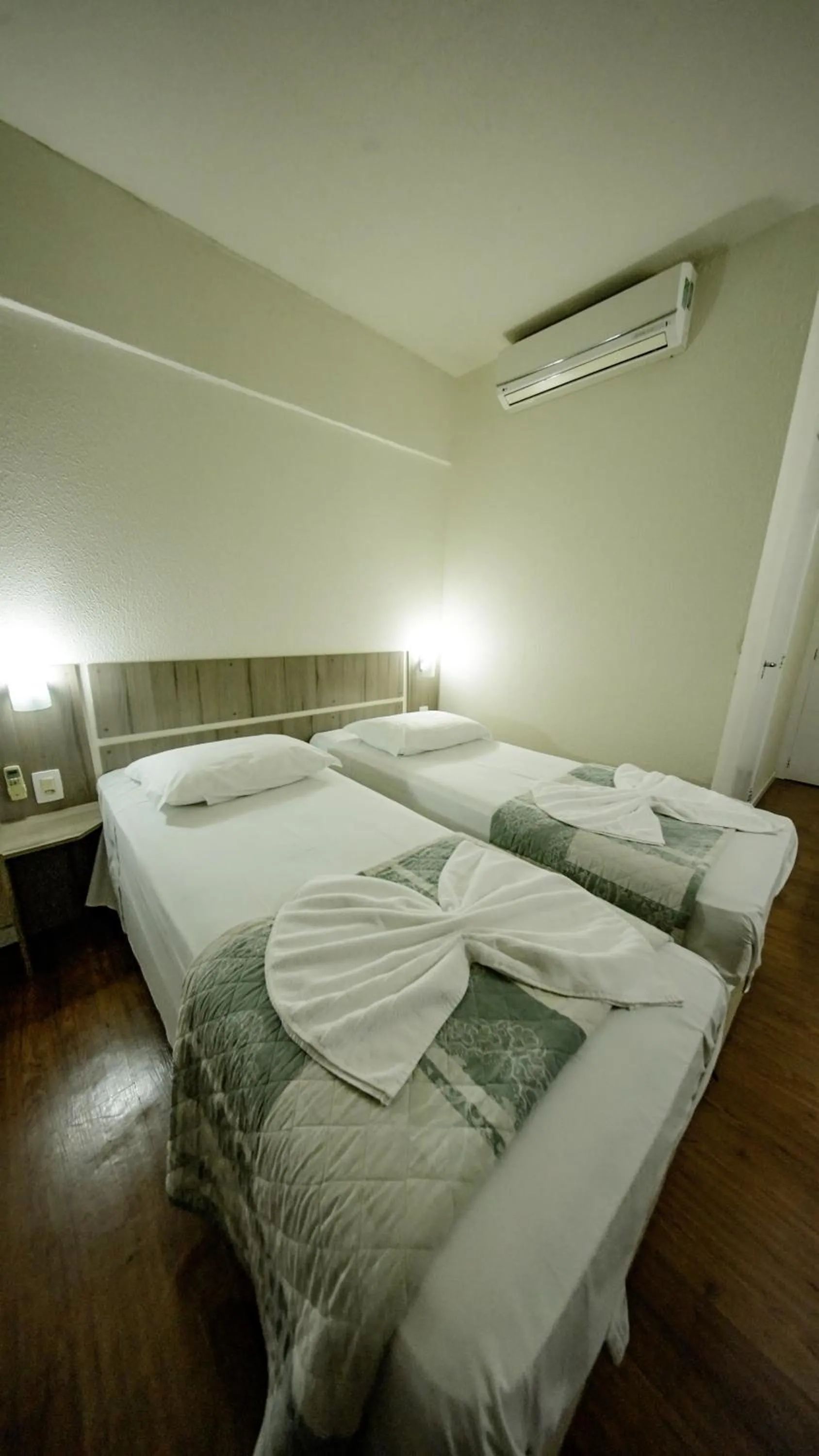Bed in LH Plaza Hotel