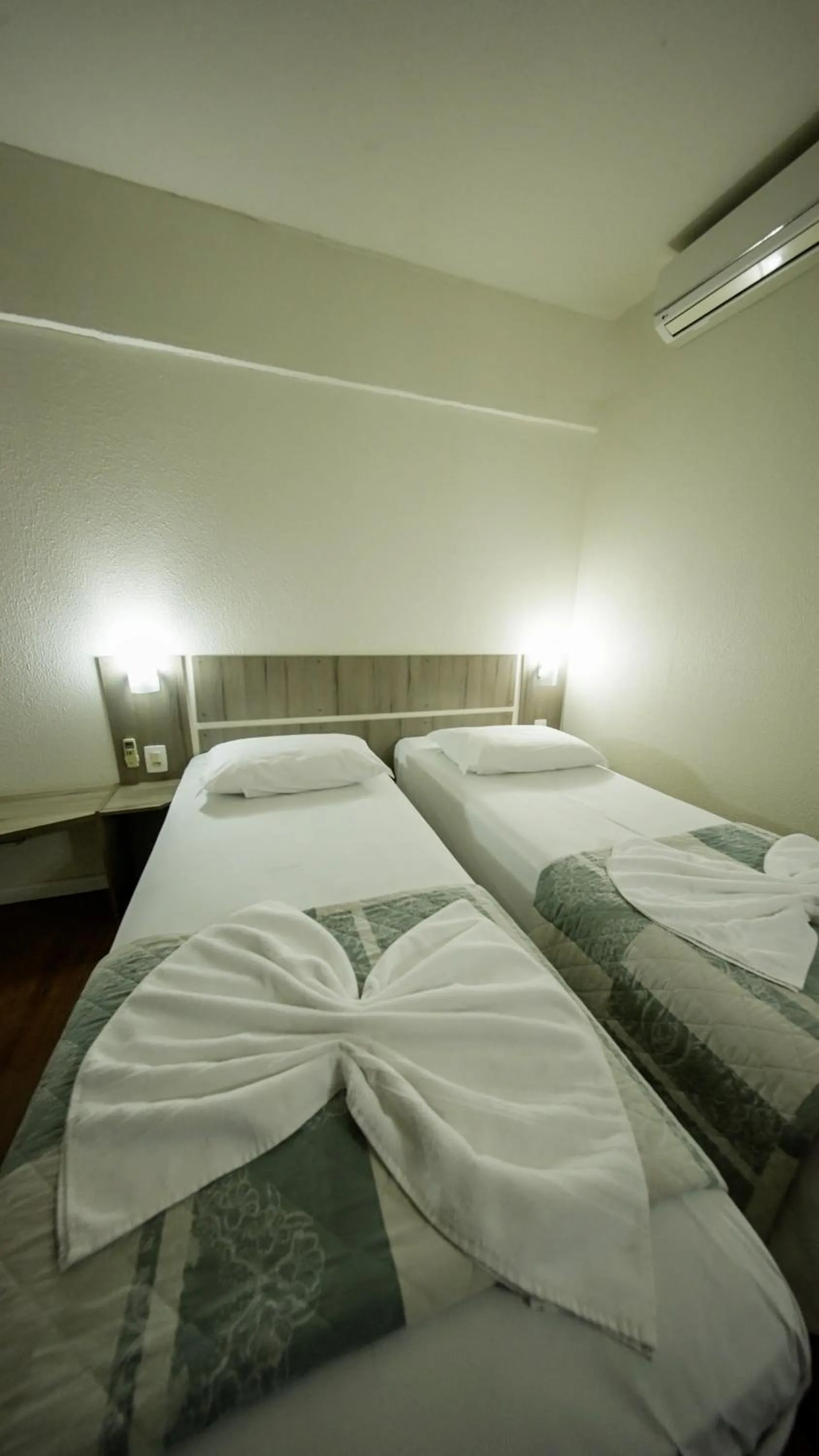 Bed in LH Plaza Hotel