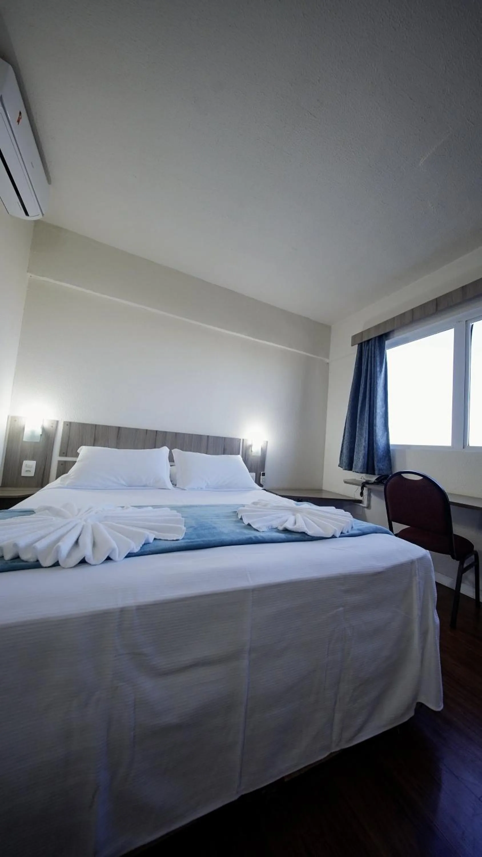 Bed in LH Plaza Hotel