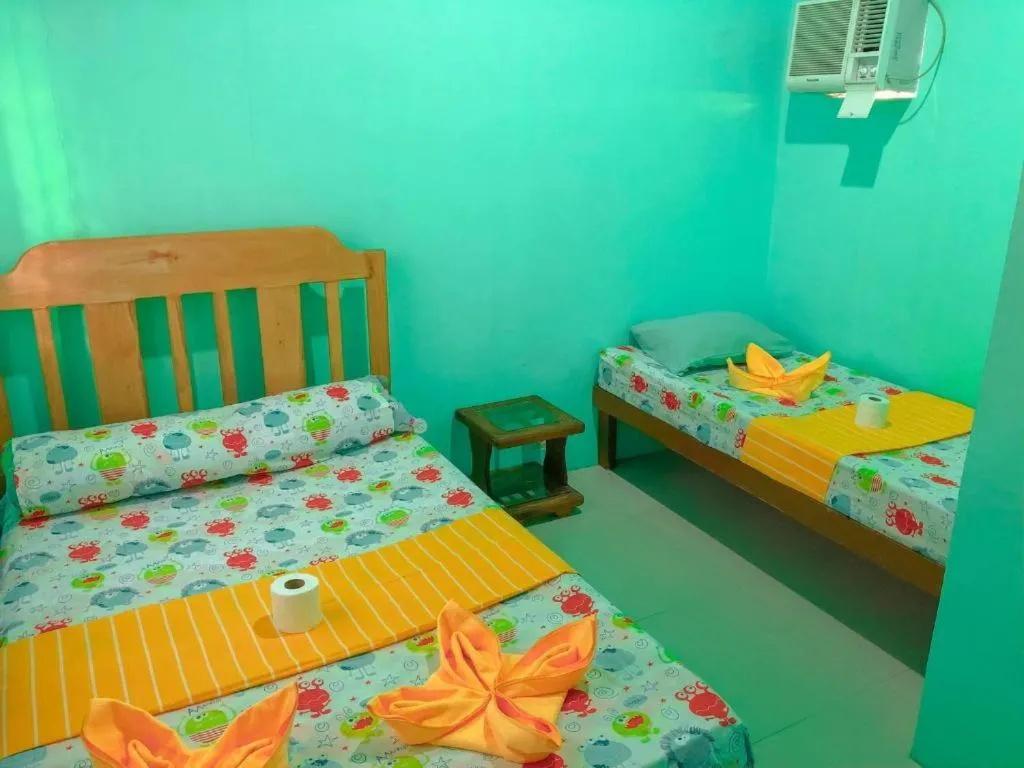 Bed in Ging Ging Homes Alona Beach