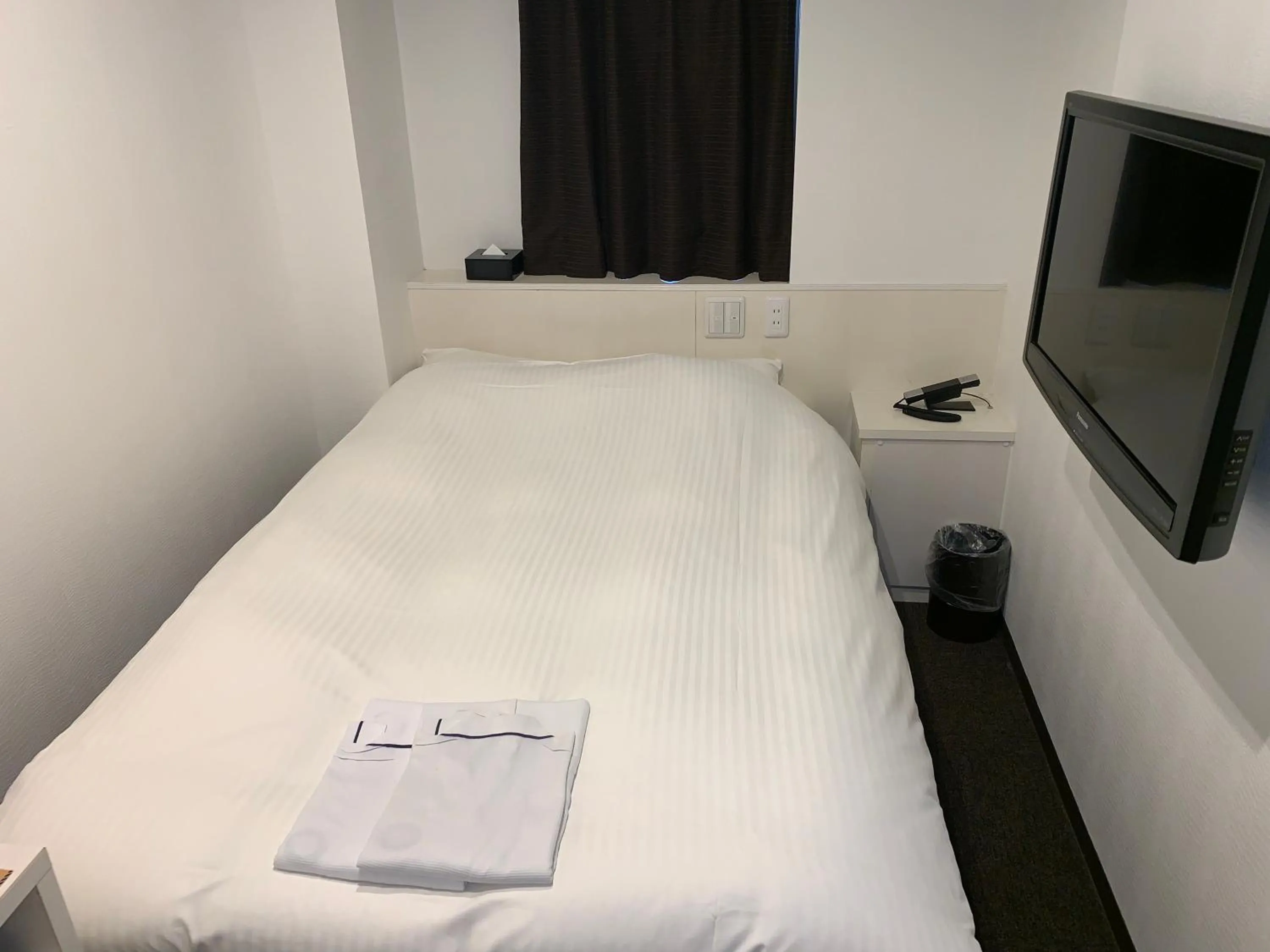 Bed in Nagoyaeki Access Hotel