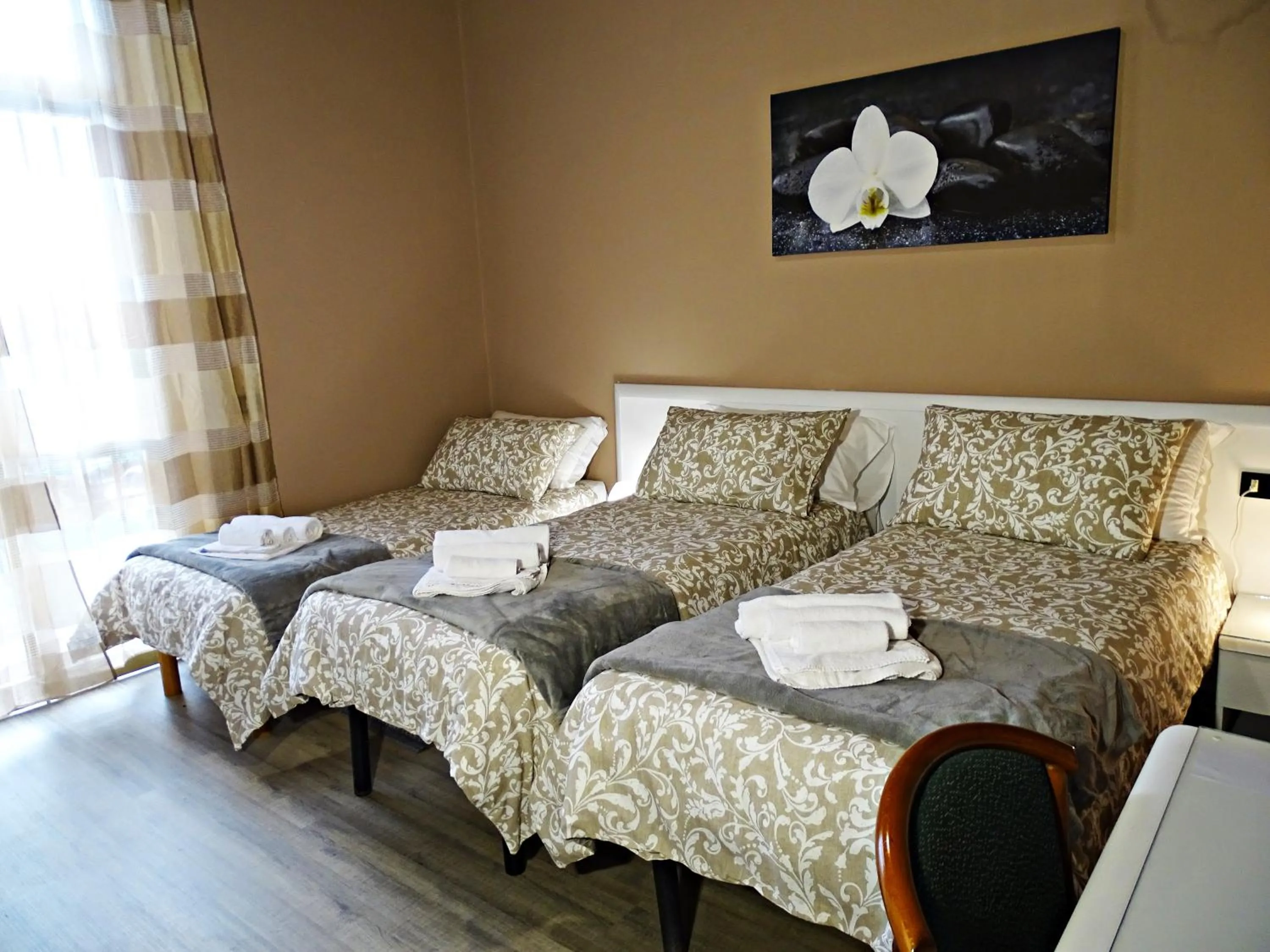 Double Room with Extra Bed in Affittacamere Arancio