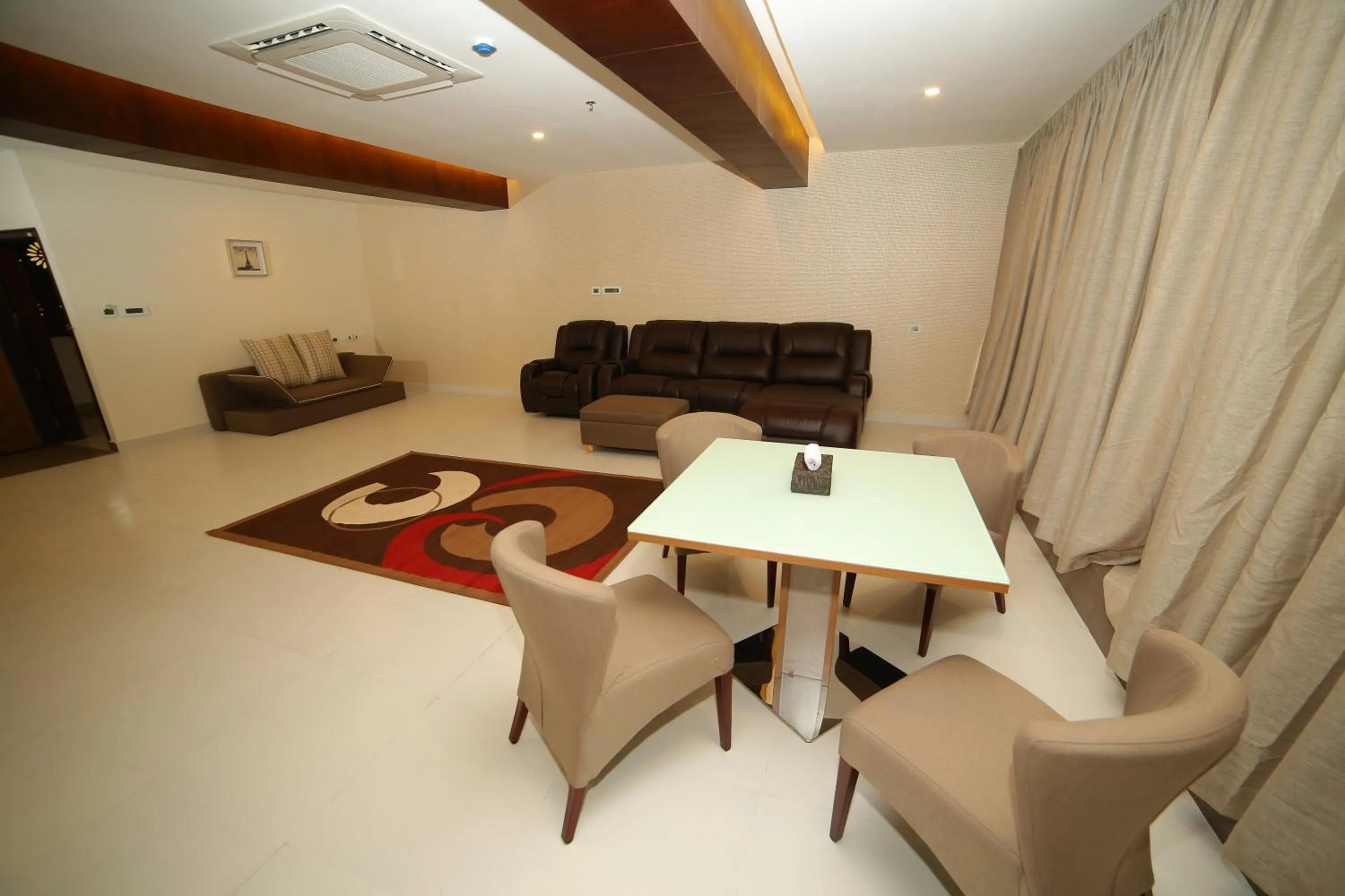 Living room in Vavas Inn & Suites