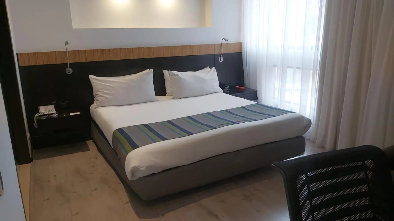 Bed in Hotel Madisson Inn Luxury By GEH Suites