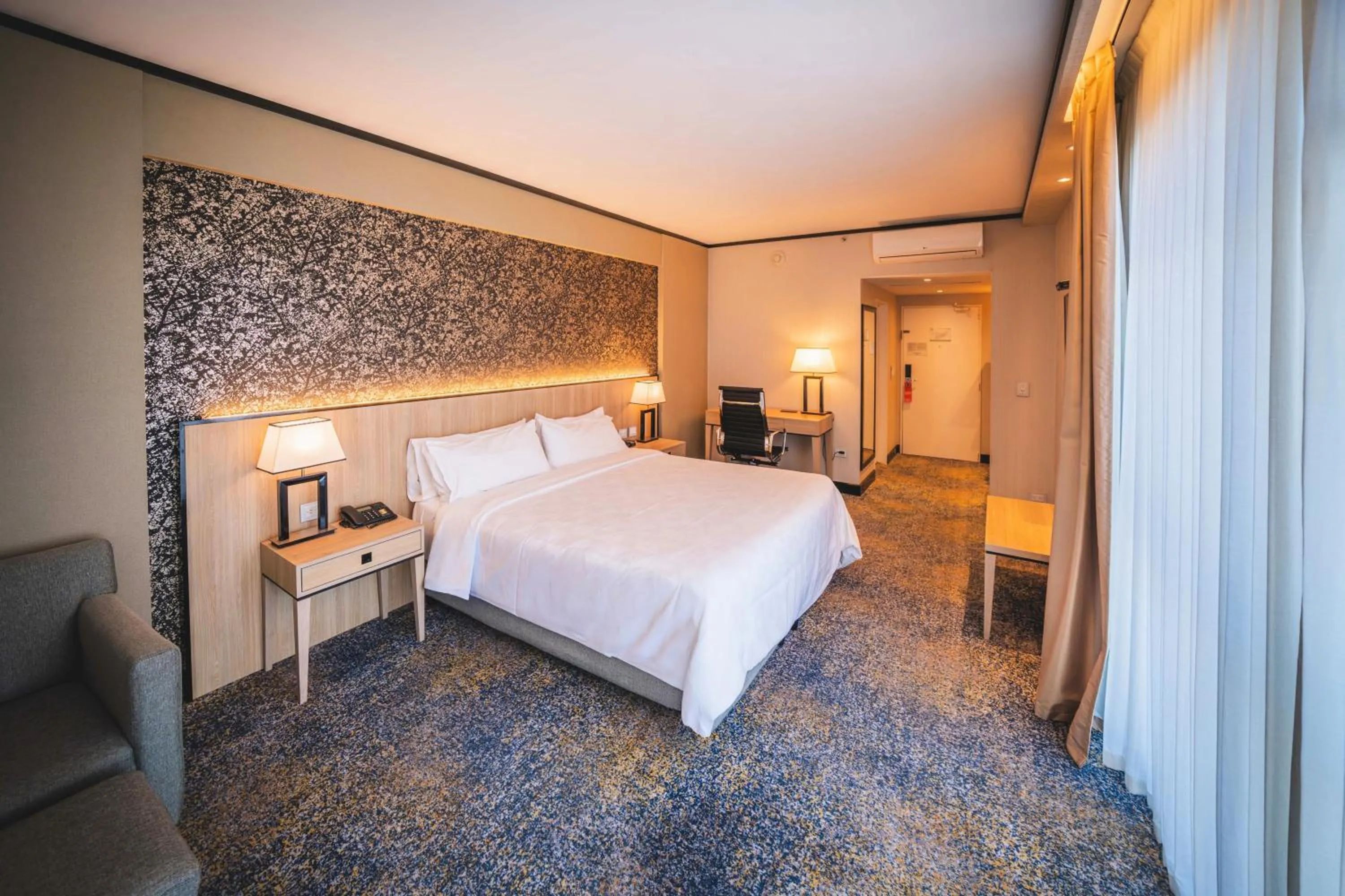 Bed in Holiday Inn Rosario by IHG