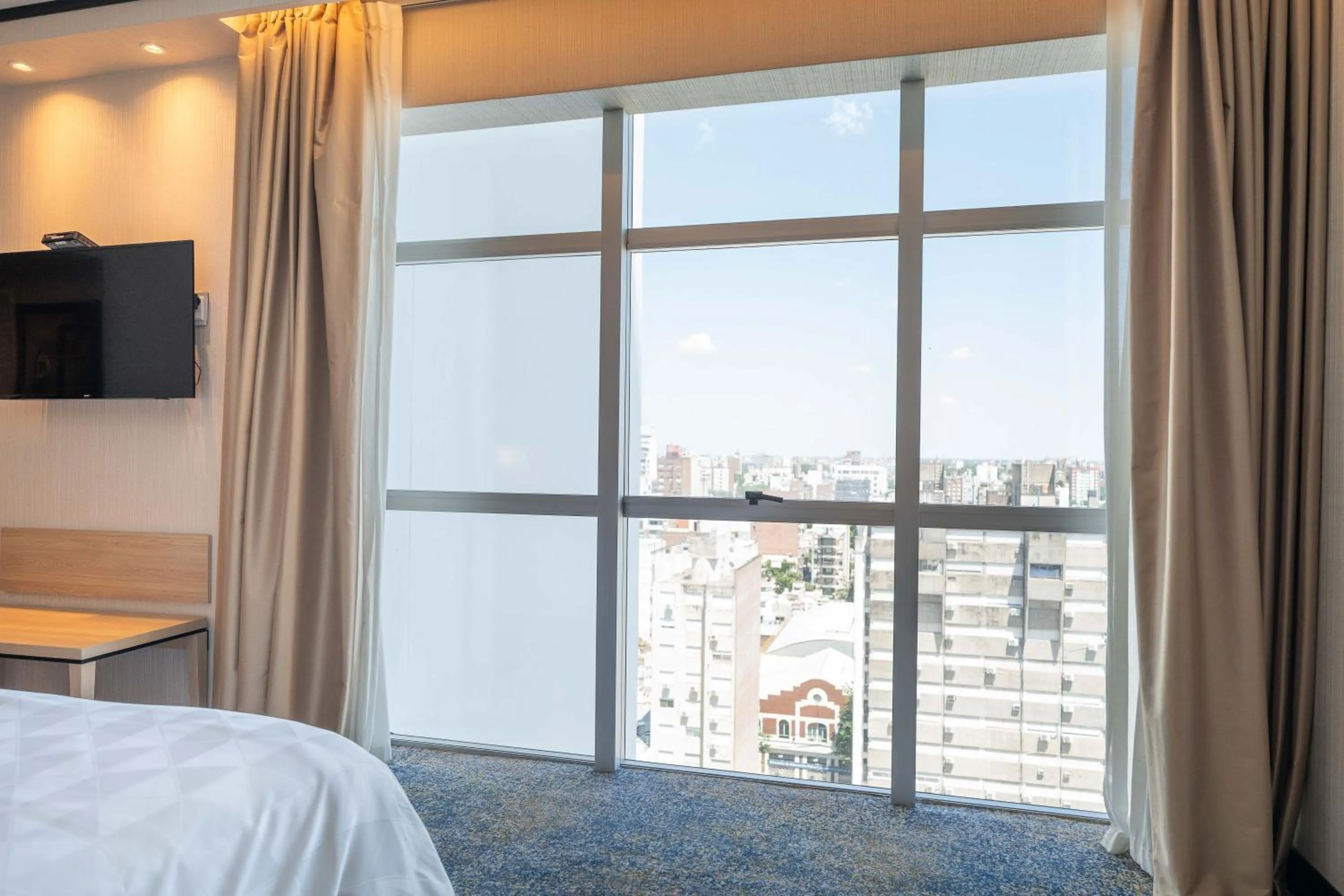 View (from property/room), Bed in Holiday Inn Rosario by IHG