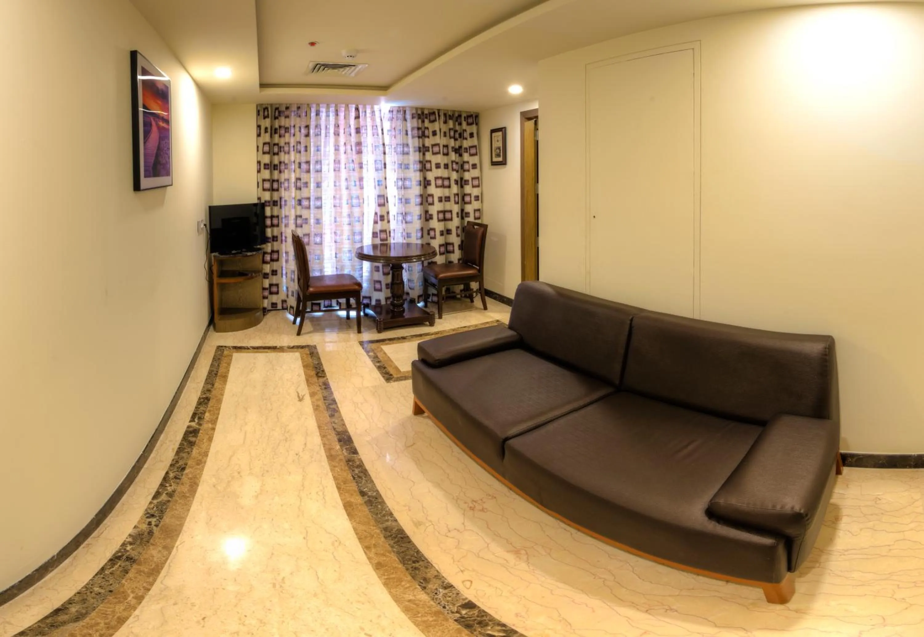 Living room in Hotel Benzz Park Vellore