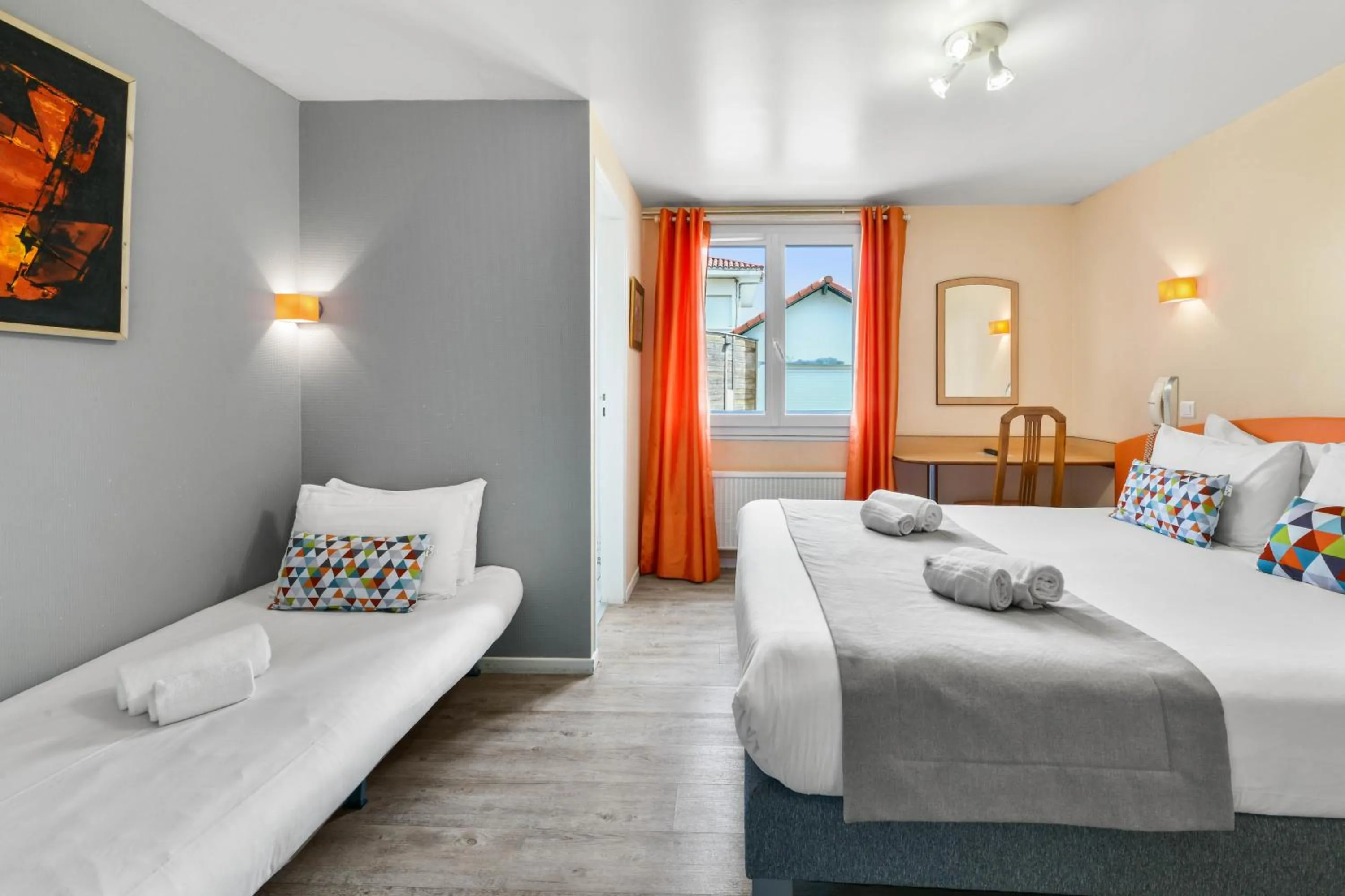 Bed in Logis Hotel de France