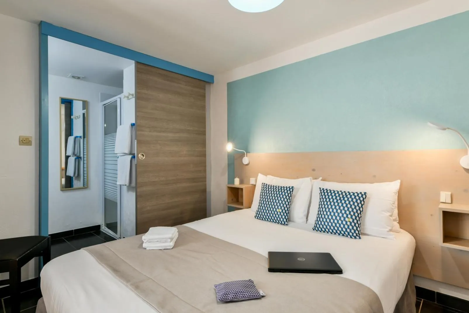 Bed in Logis Hotel de France