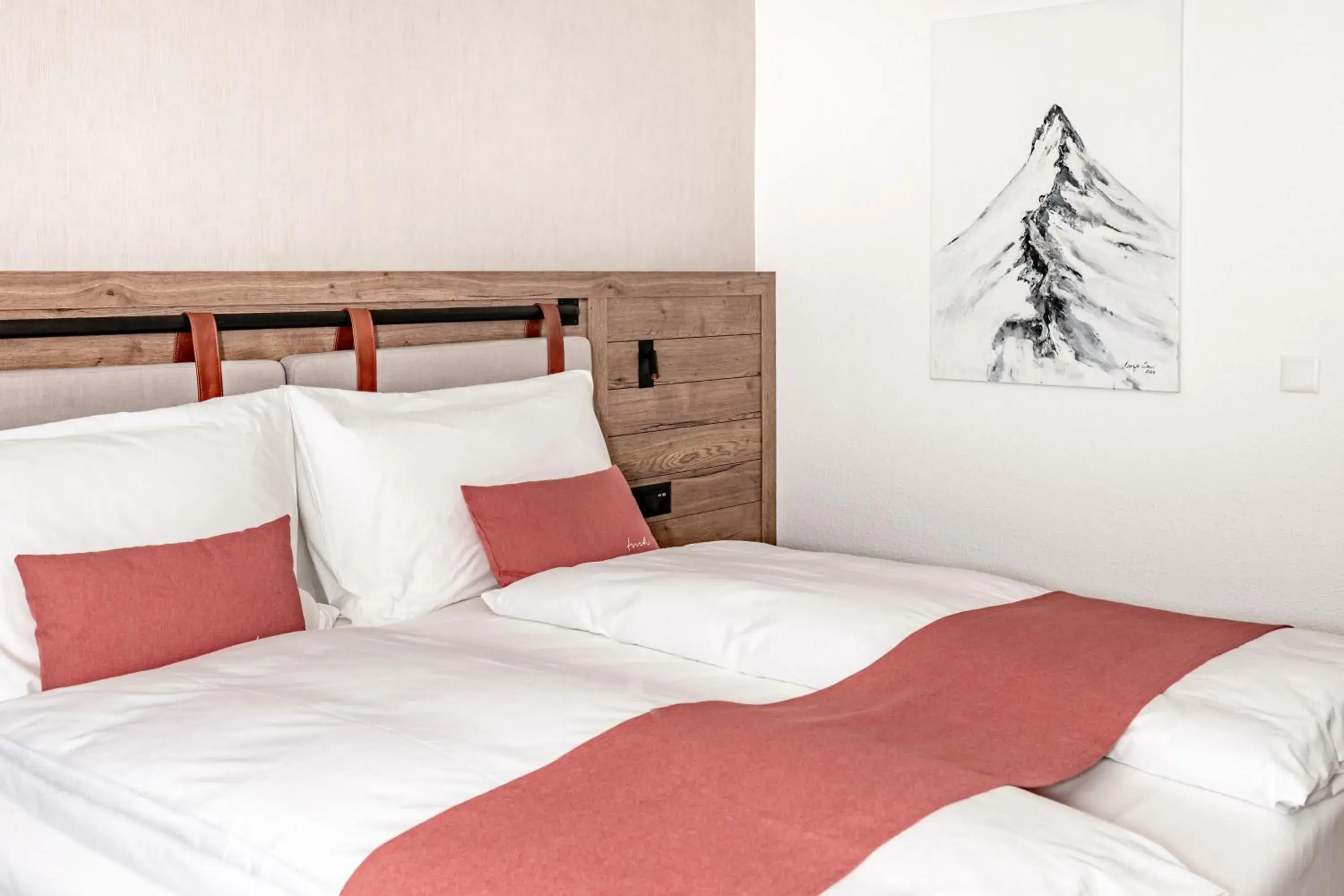 Bed in Tailormade Hotel KRONE Sarnen Bed in Tailormade Hotel KRONE Sarnen