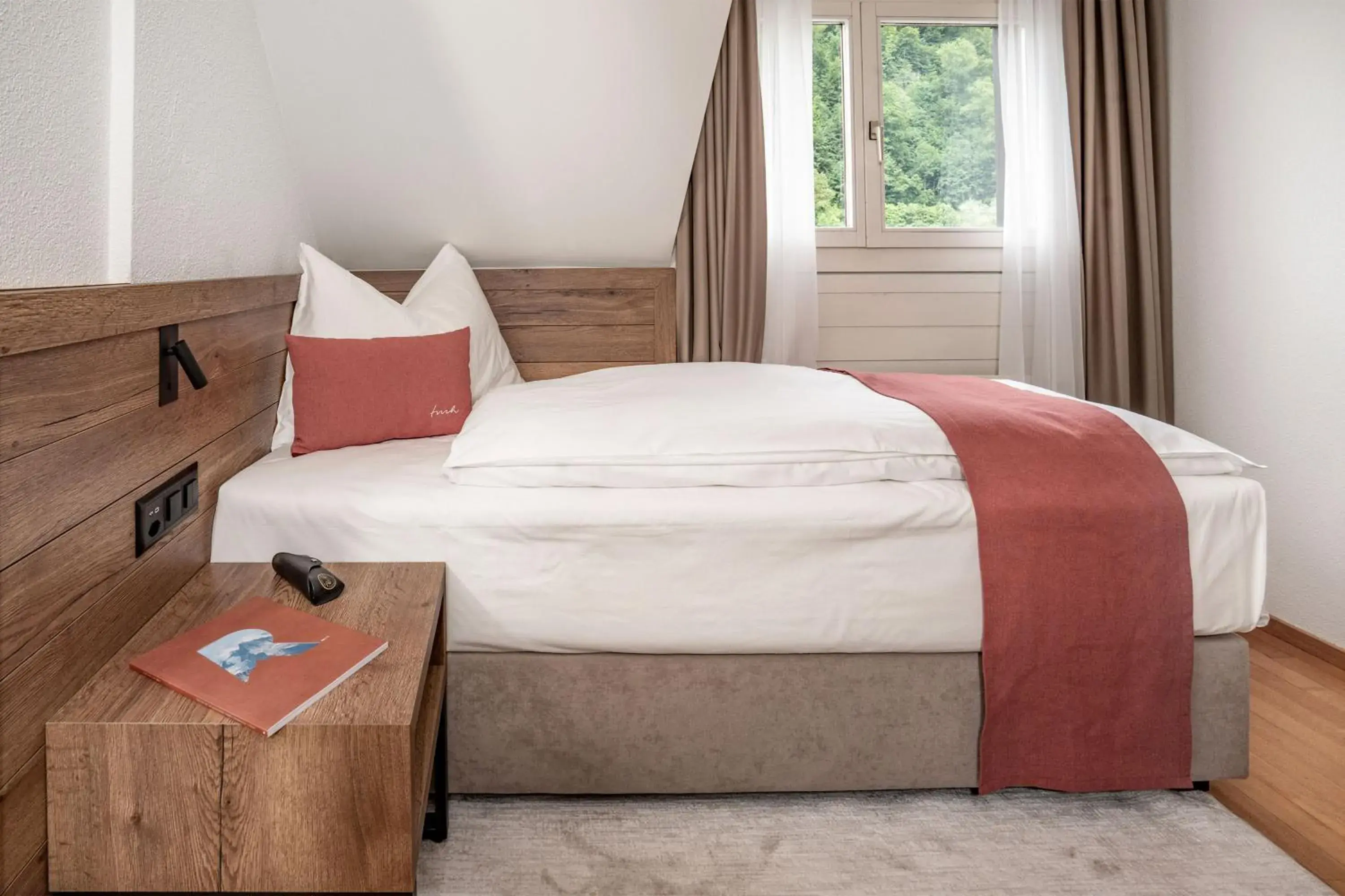 Bed in Tailormade Hotel KRONE Sarnen Bed in Tailormade Hotel KRONE Sarnen