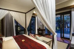 Bed in Natya Villa Jimbaran