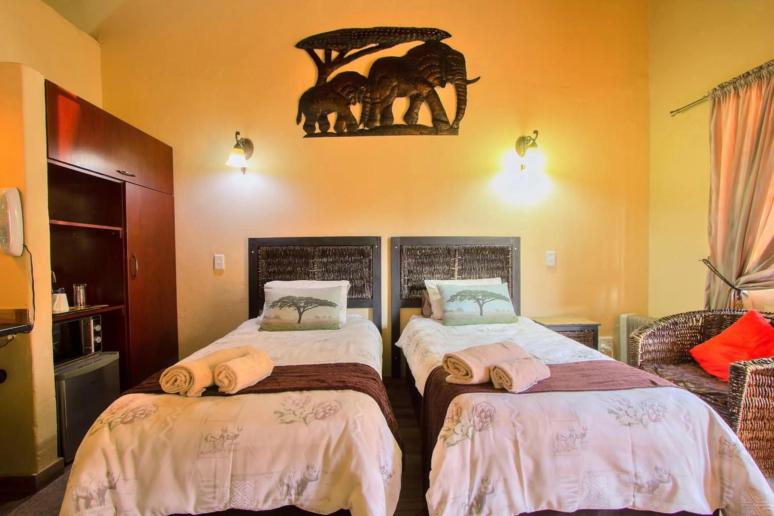 Photo of the whole room, Bed in All over Africa Guest house