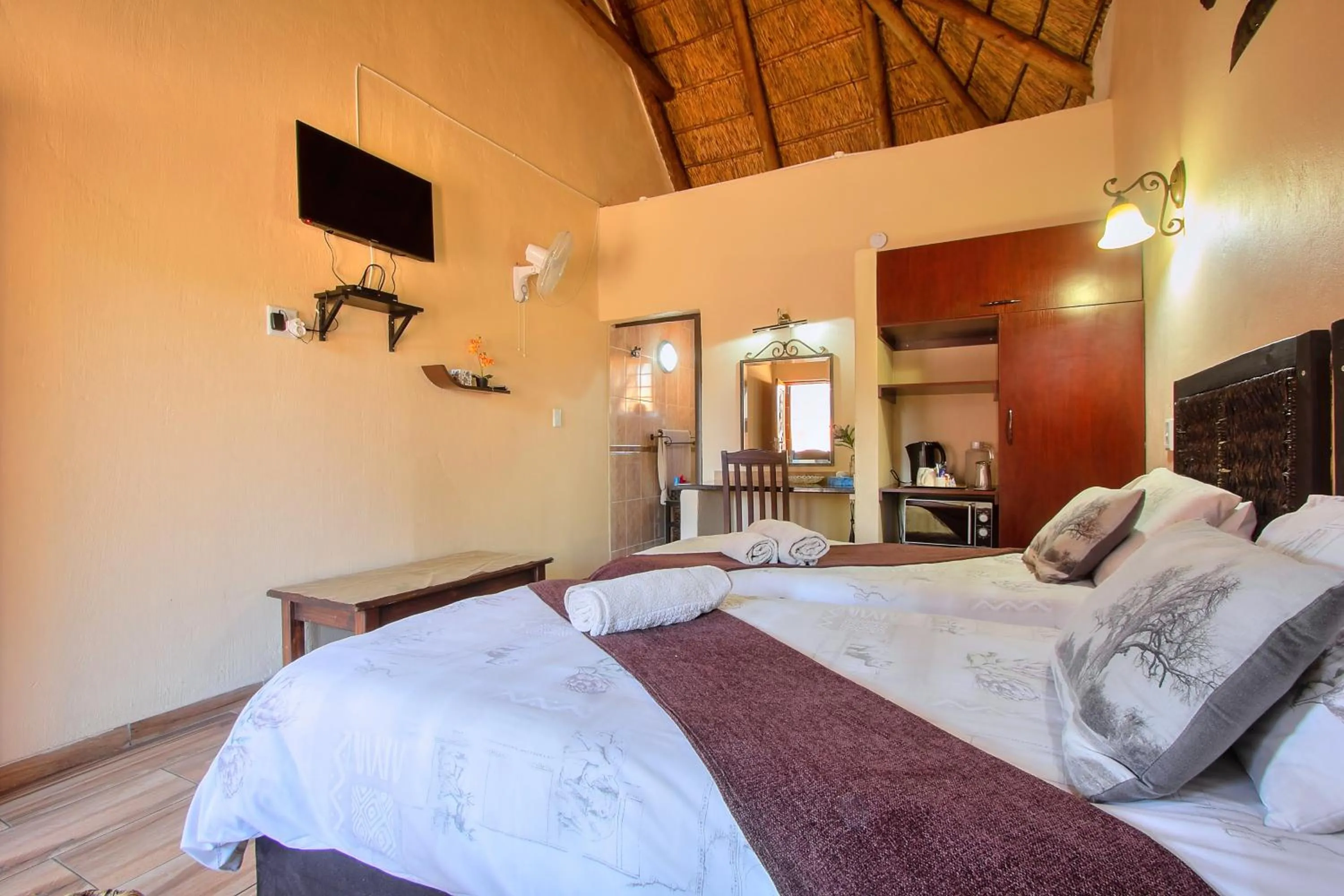 Photo of the whole room, Bed in All over Africa Guest house