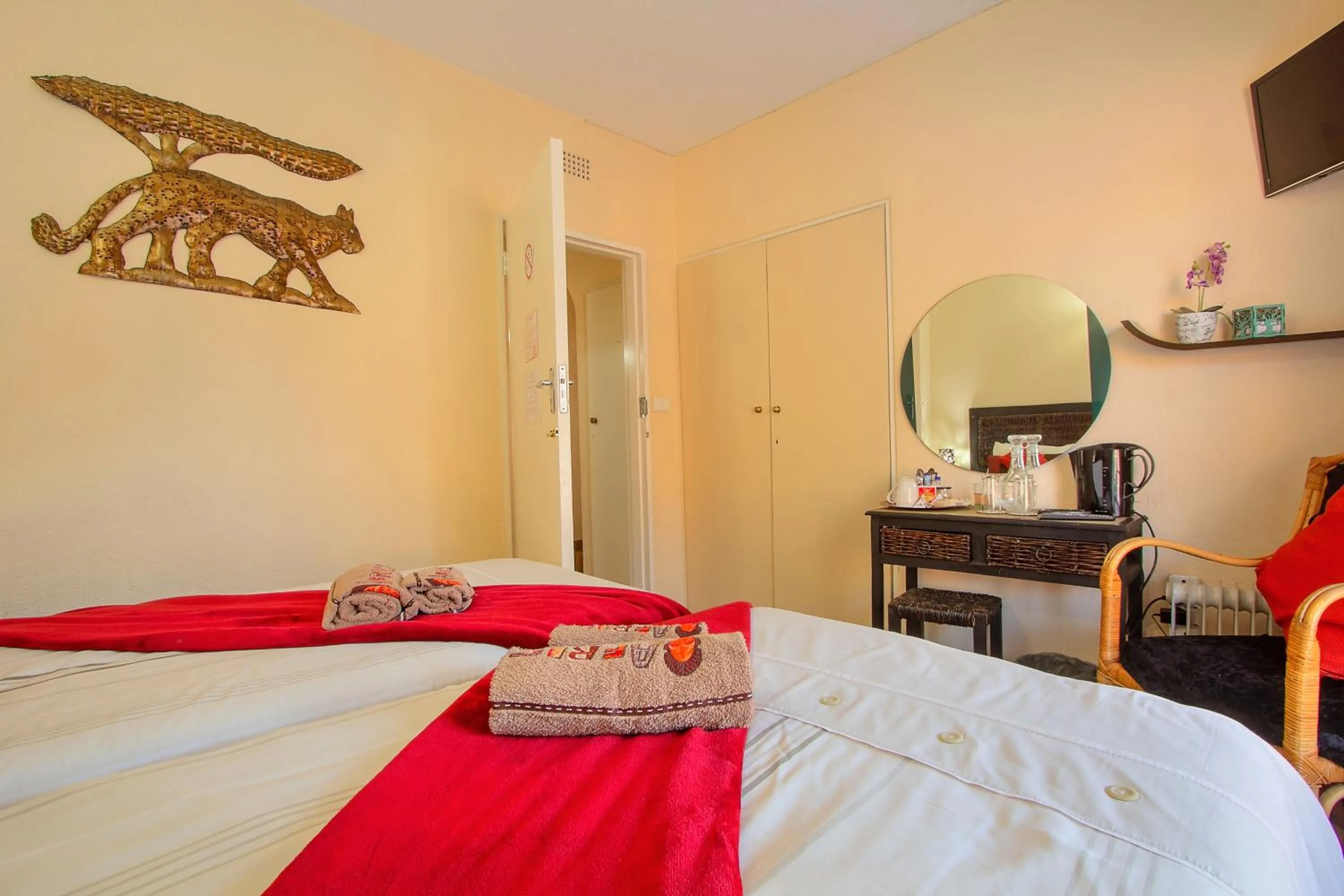 Photo of the whole room, Bed in All over Africa Guest house