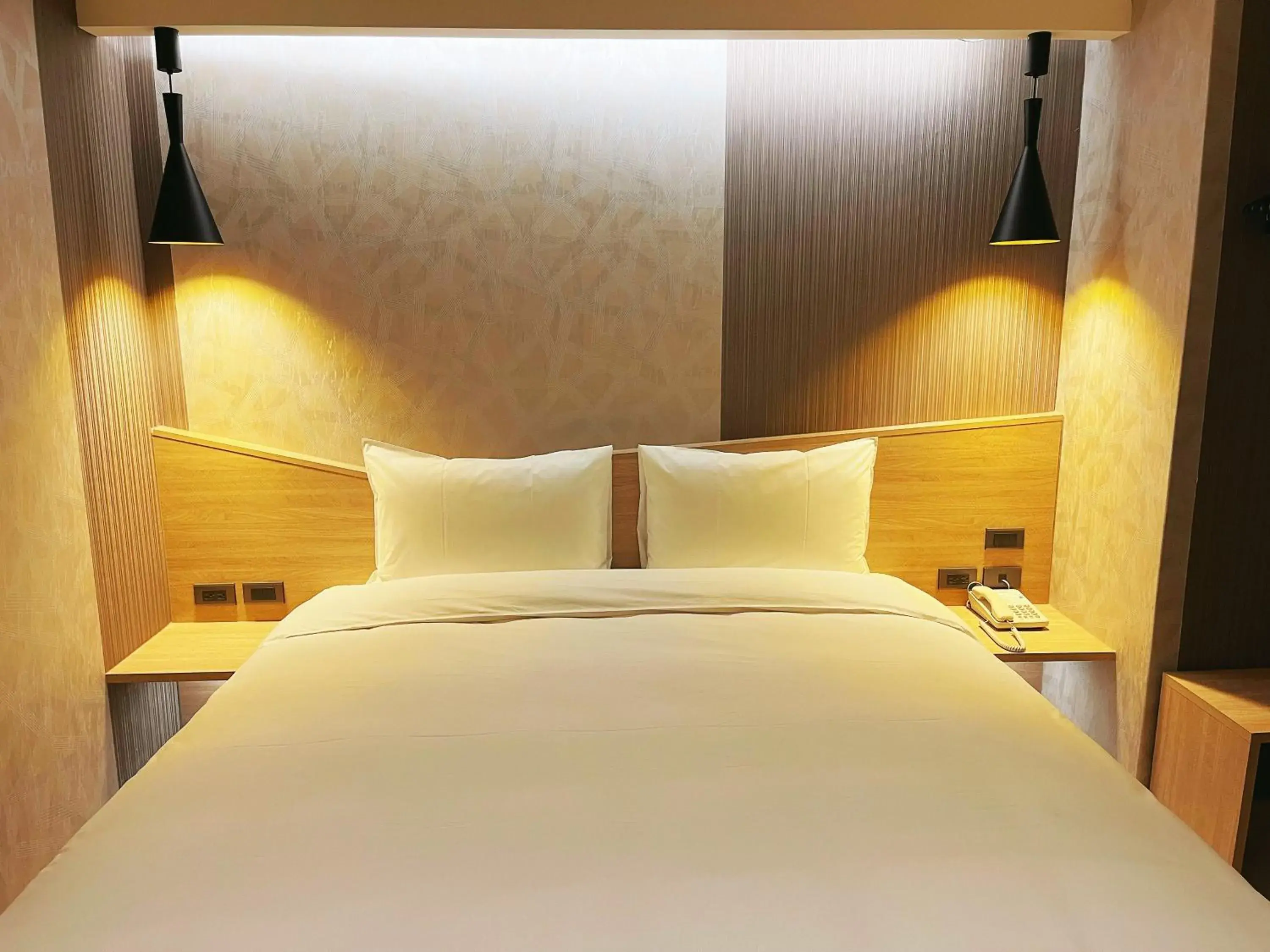 Bed in 新仕飯店-New City Hotel Bed in 新仕飯店-New City Hotel