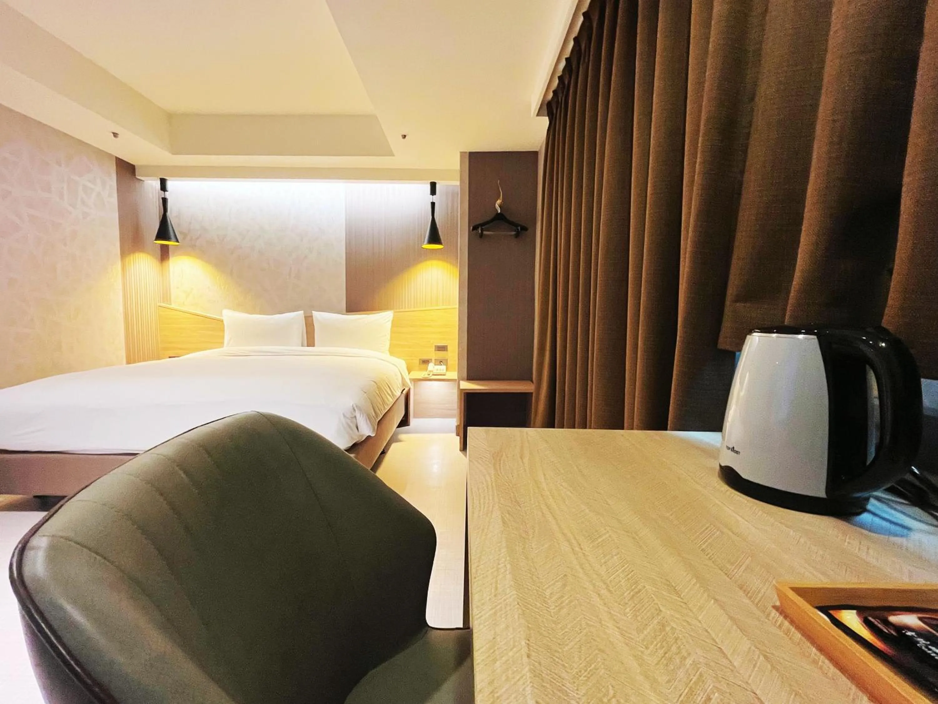 Living room, Bed in 新仕飯店-New City Hotel