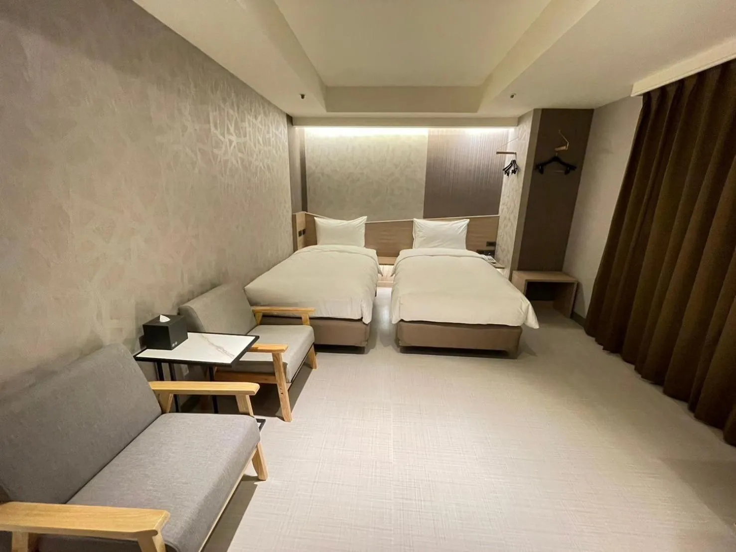 Bed in 新仕飯店-New City Hotel
