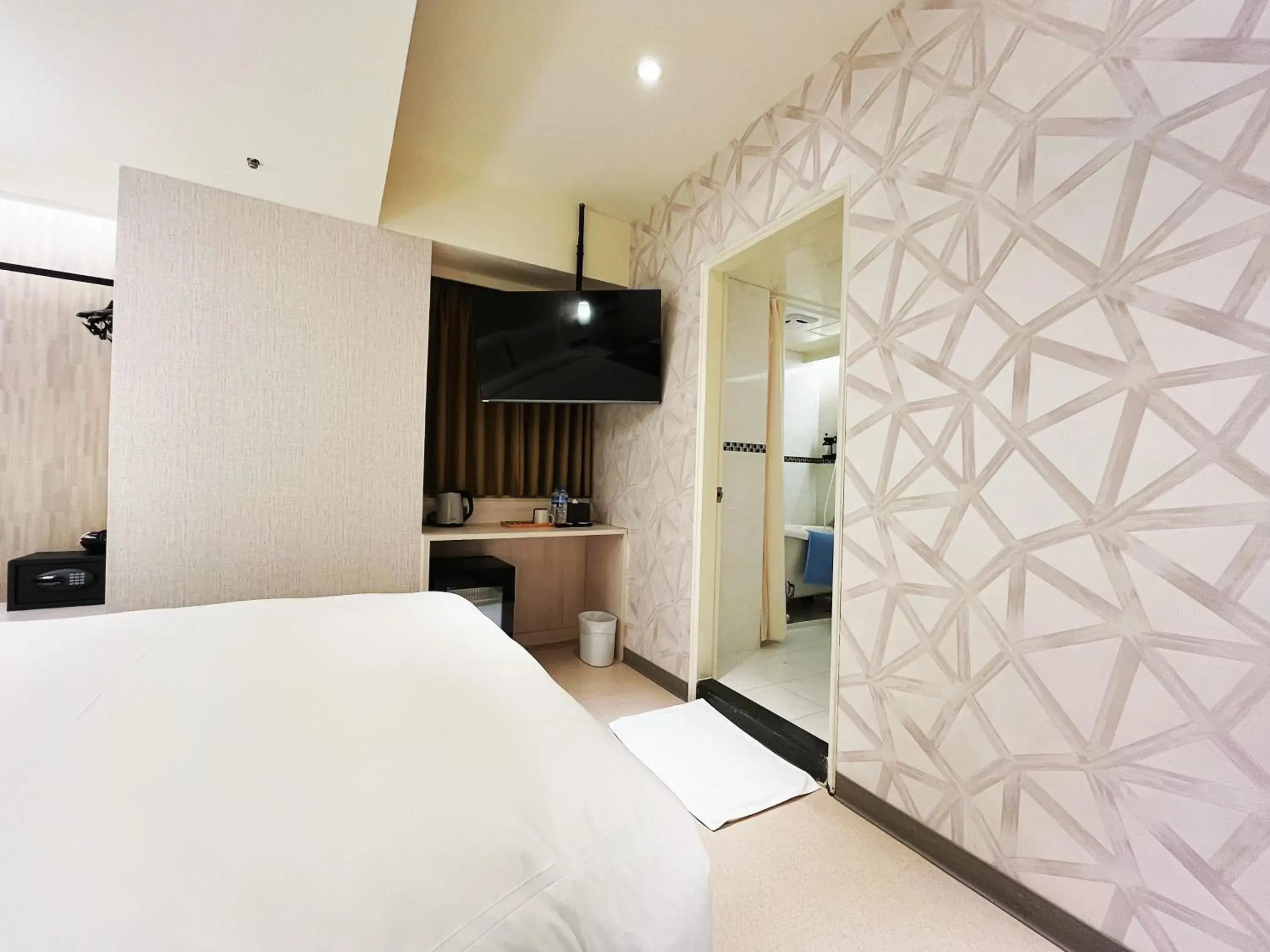 Bed in 新仕飯店-New City Hotel Bed in 新仕飯店-New City Hotel