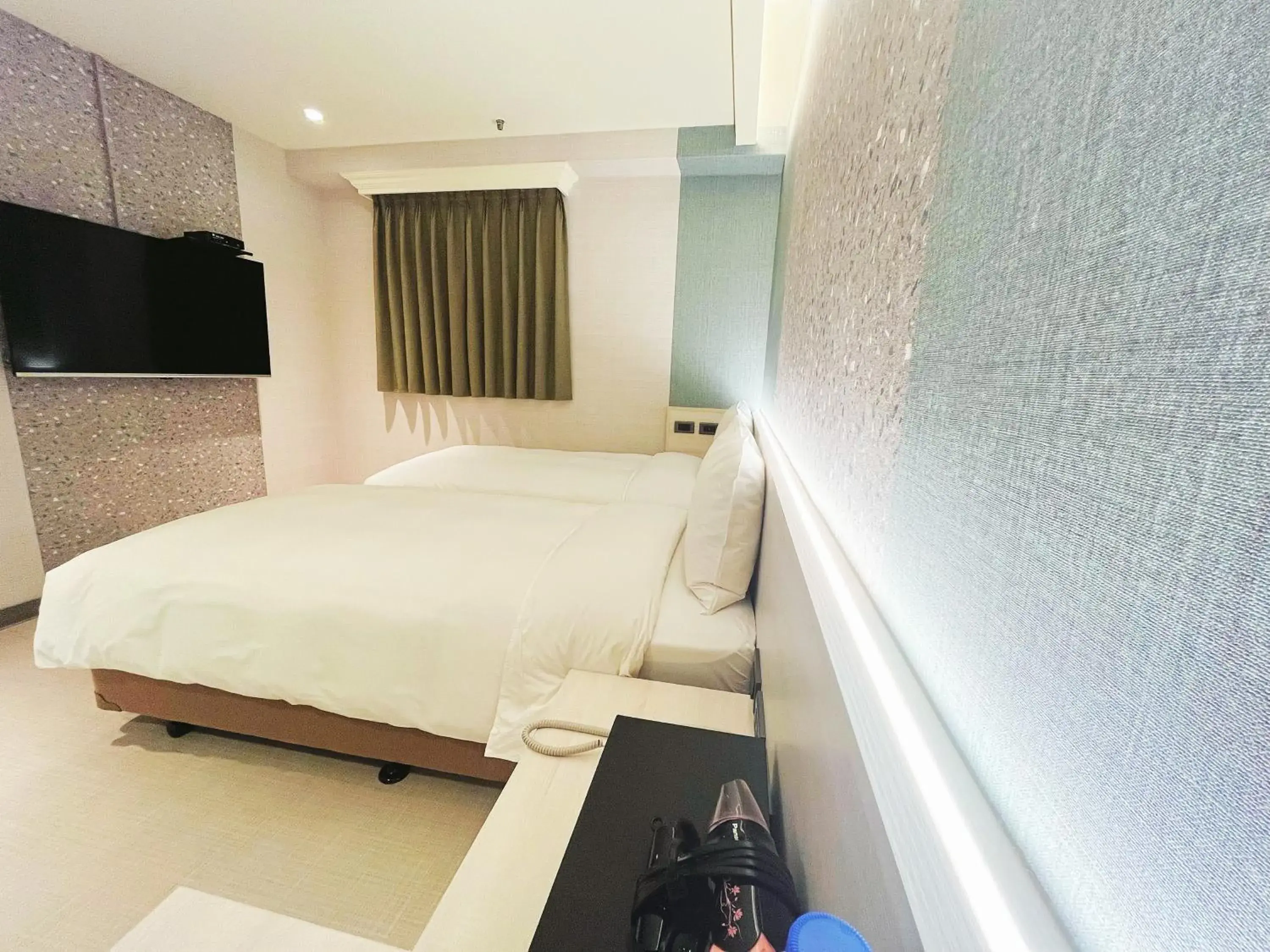 Bed in 新仕飯店-New City Hotel Bed in 新仕飯店-New City Hotel