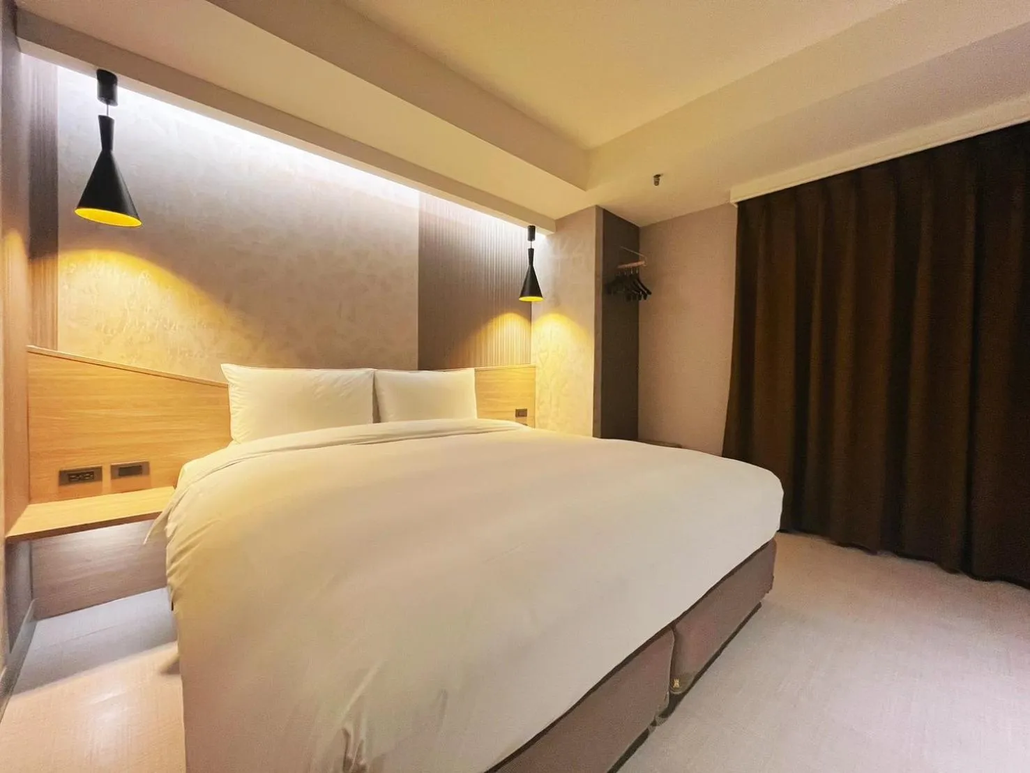 Bed in 新仕飯店-New City Hotel