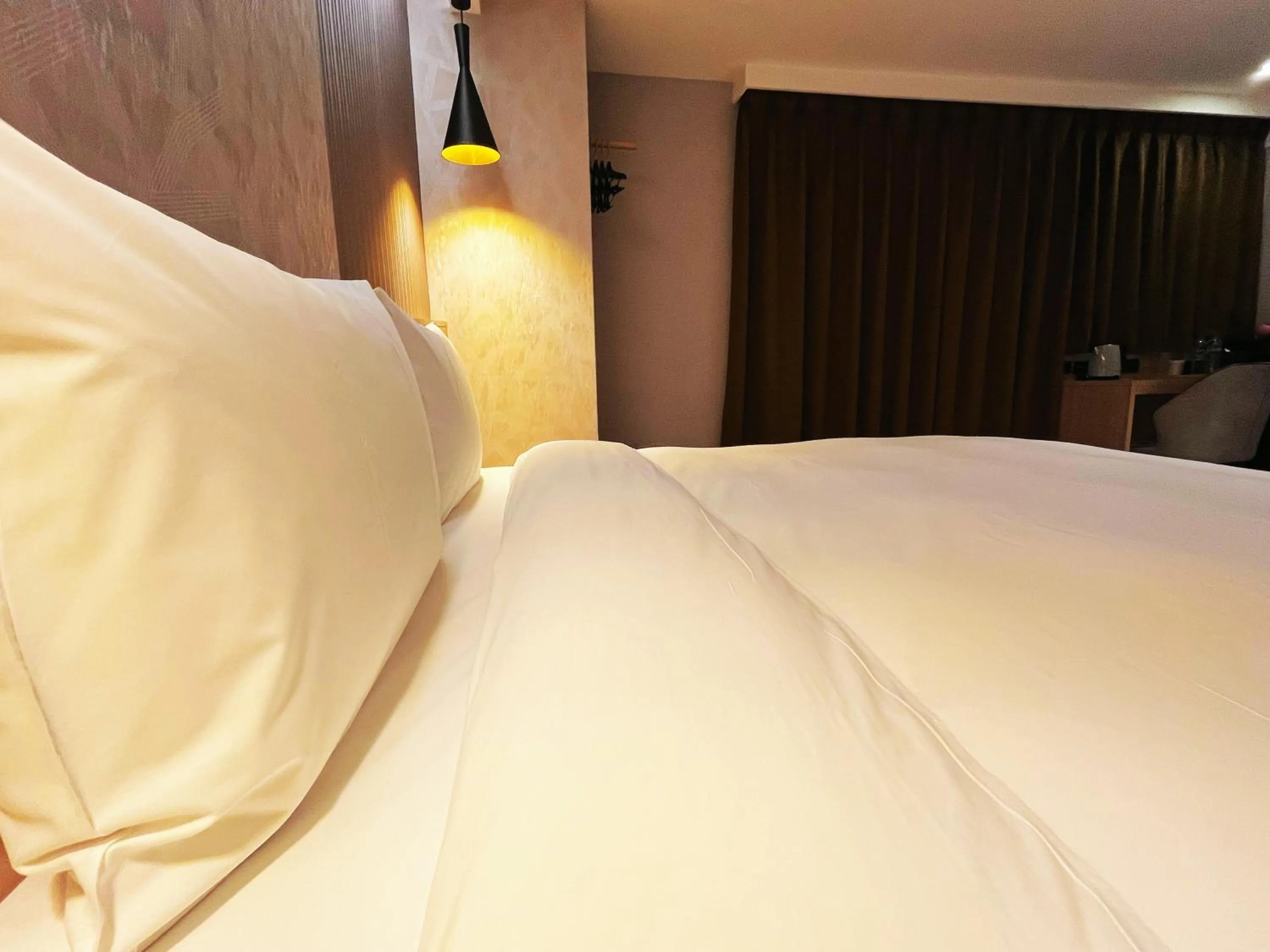 Bed in 新仕飯店-New City Hotel