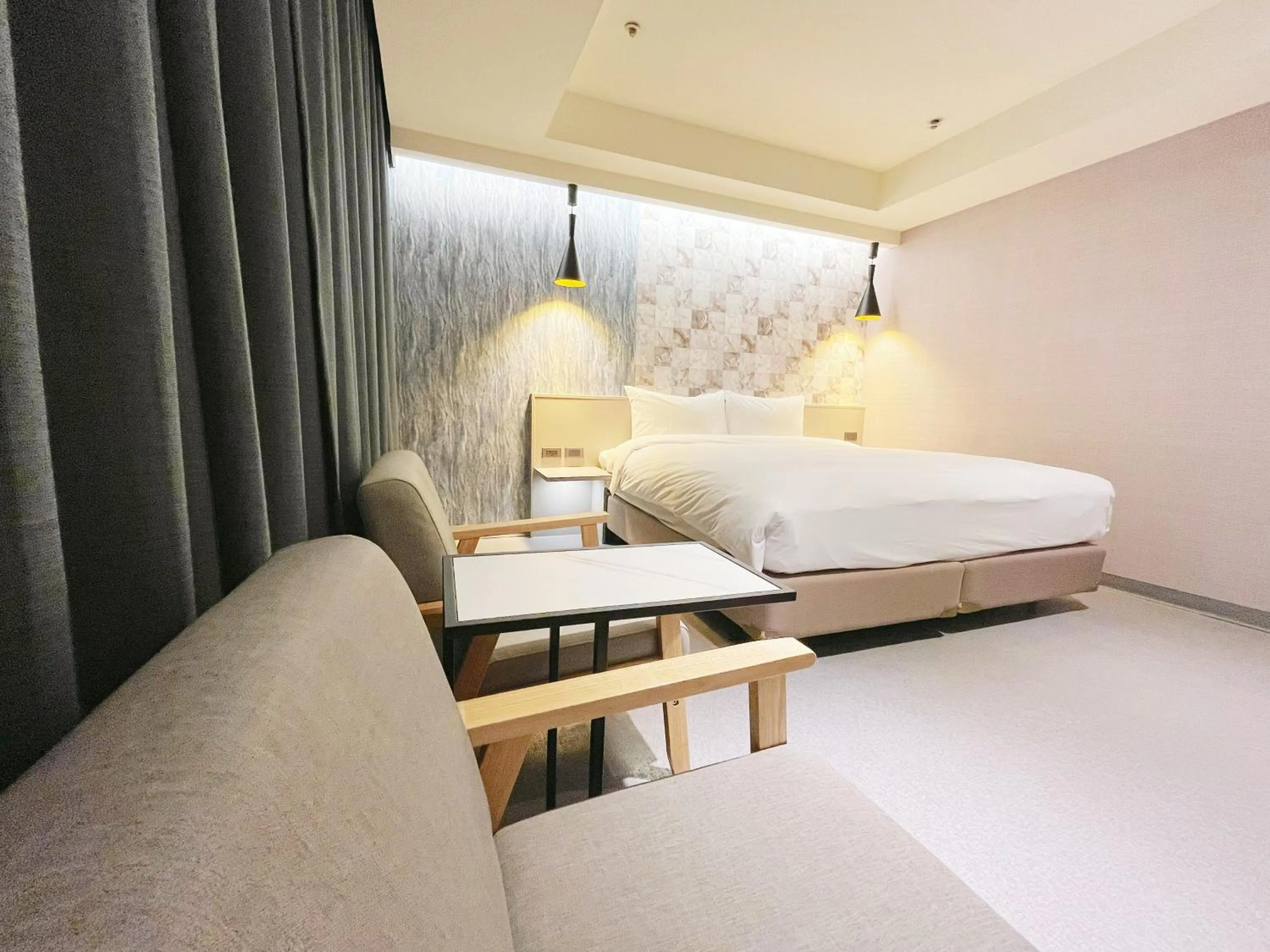 Bed in 新仕飯店-New City Hotel