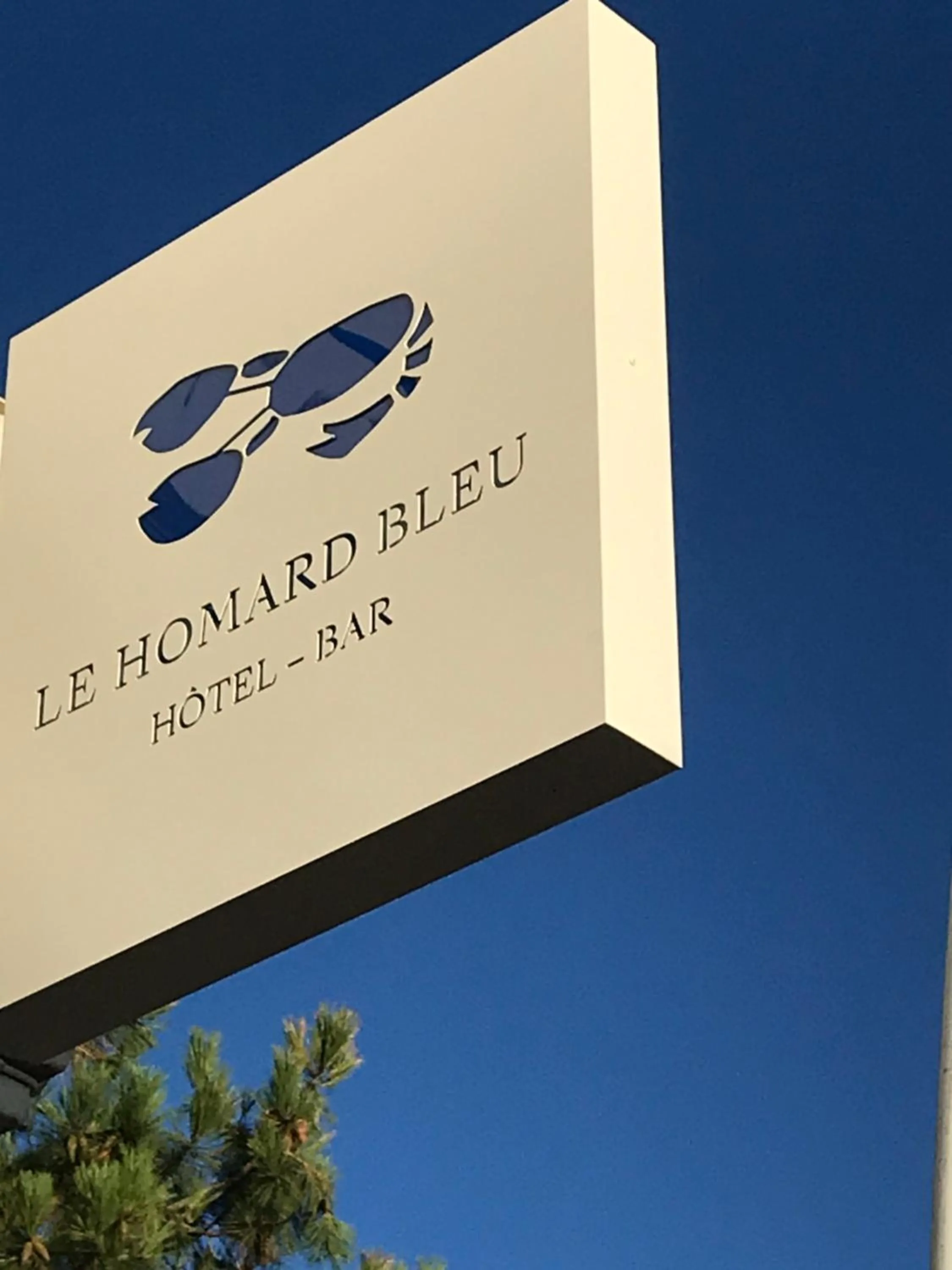 Property logo or sign in Le Homard Bleu
