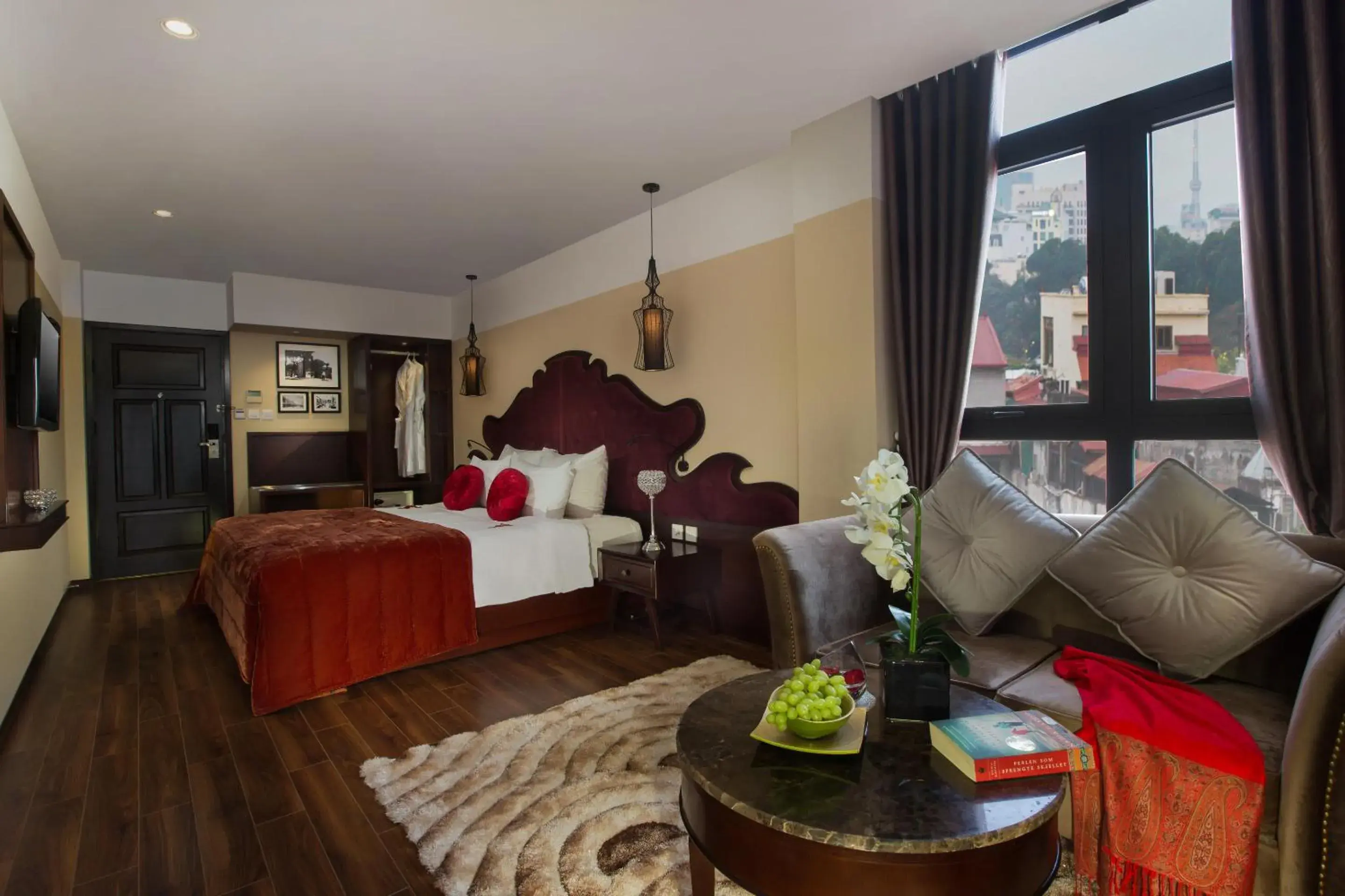 Seating area, Bed in Ambassador Hanoi Hotel & Spa Seating area, Bed in Ambassador Hanoi Hotel & Spa