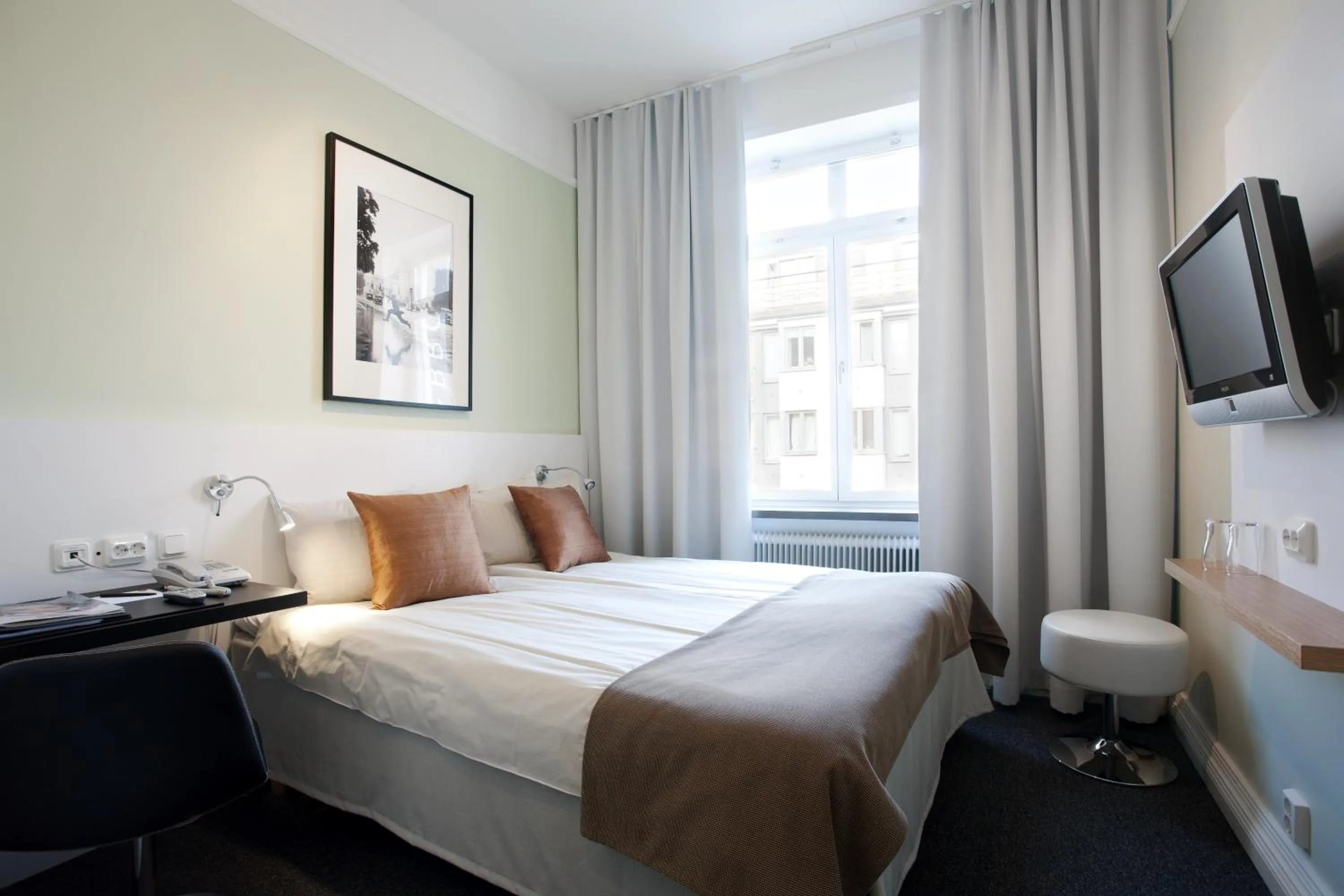 Photo of the whole room, Bed in Hotel Örebro