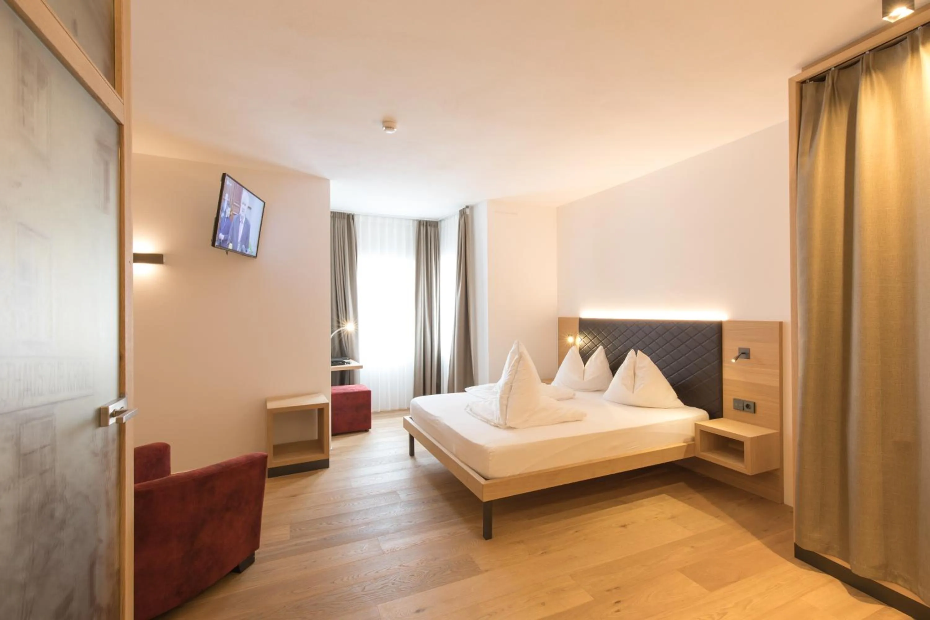 Bed in Belvenu Boutique Hotel