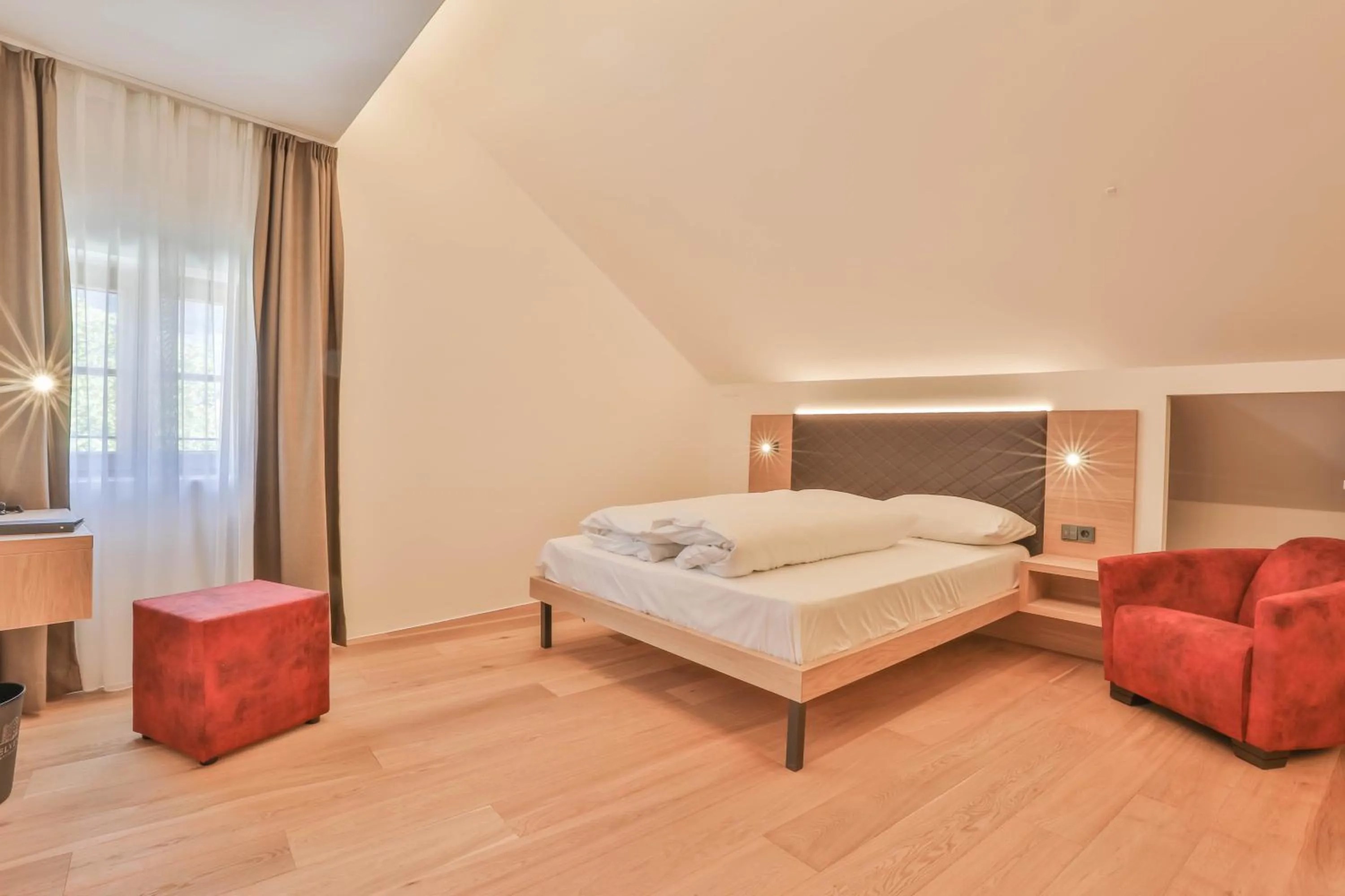 Bed in Belvenu Boutique Hotel