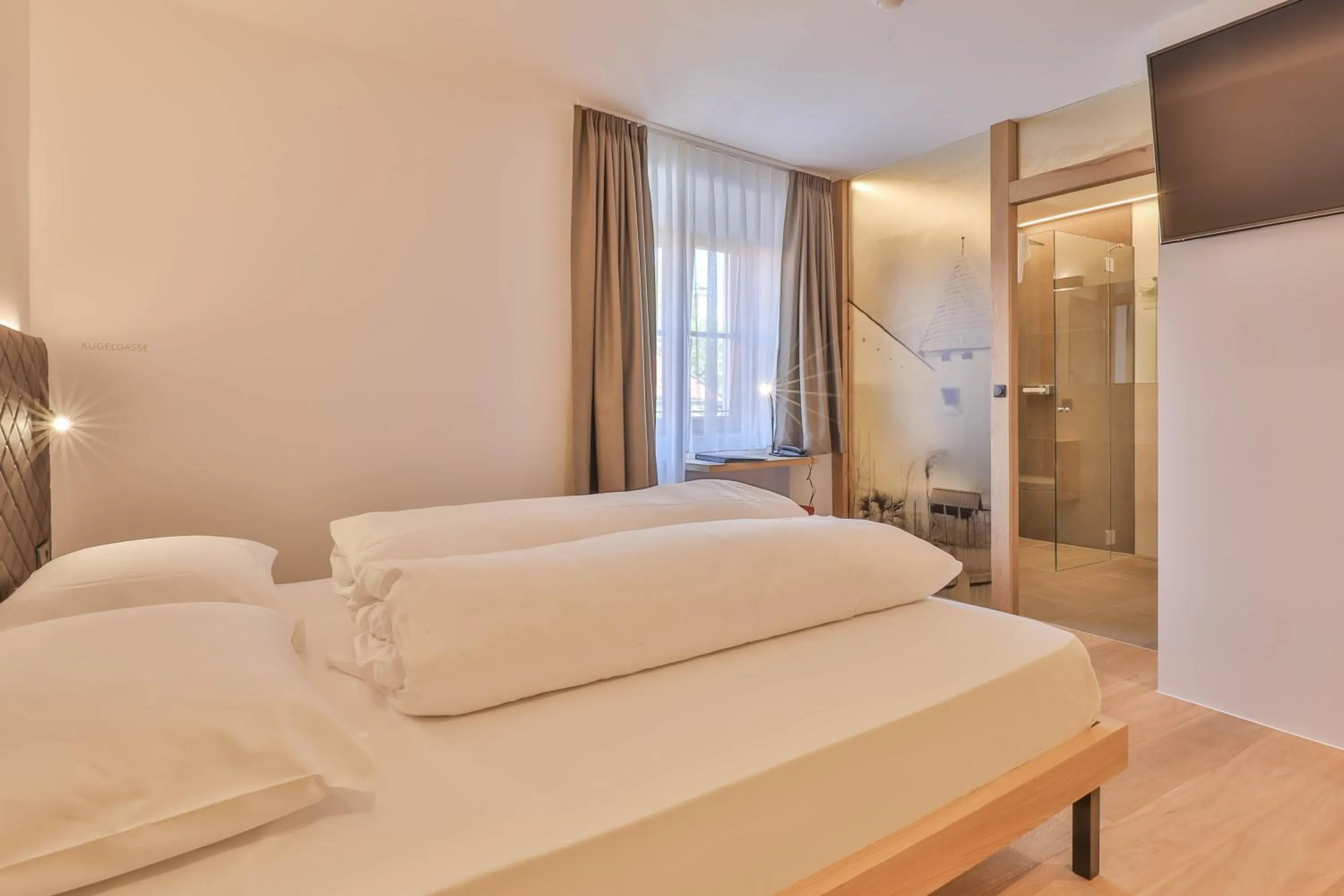 Bed in Belvenu Boutique Hotel