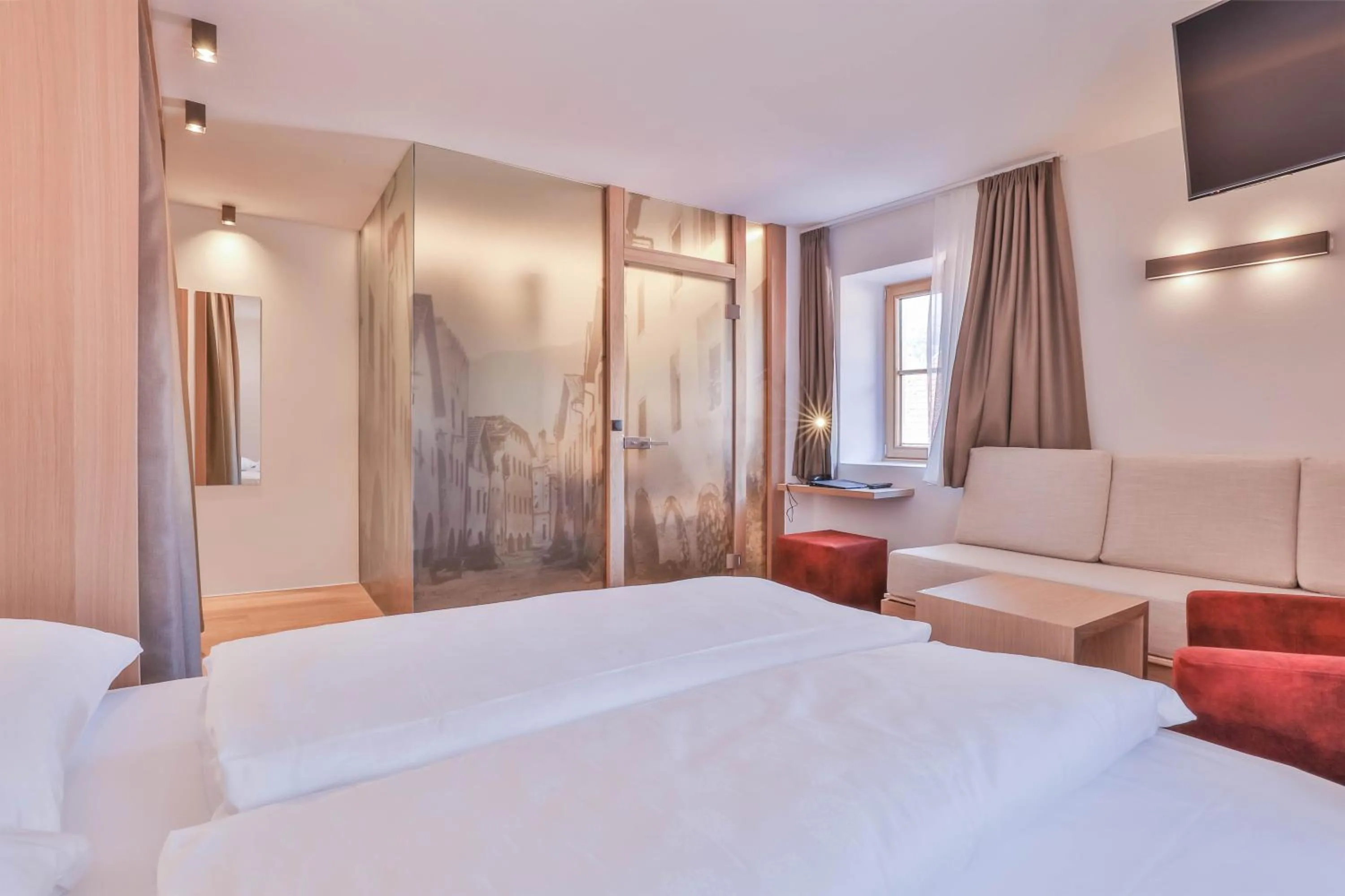 Bed in Belvenu Boutique Hotel