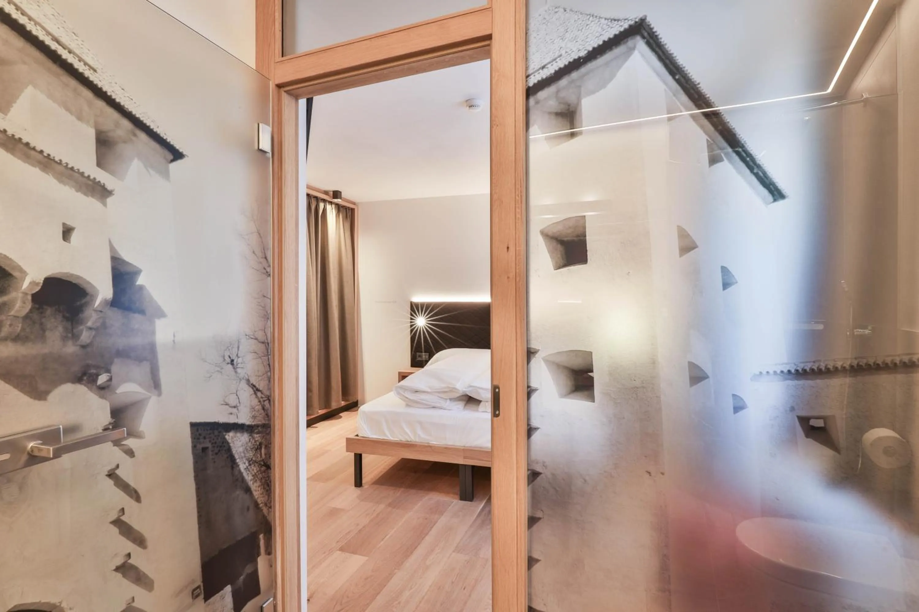 Bed in Belvenu Boutique Hotel