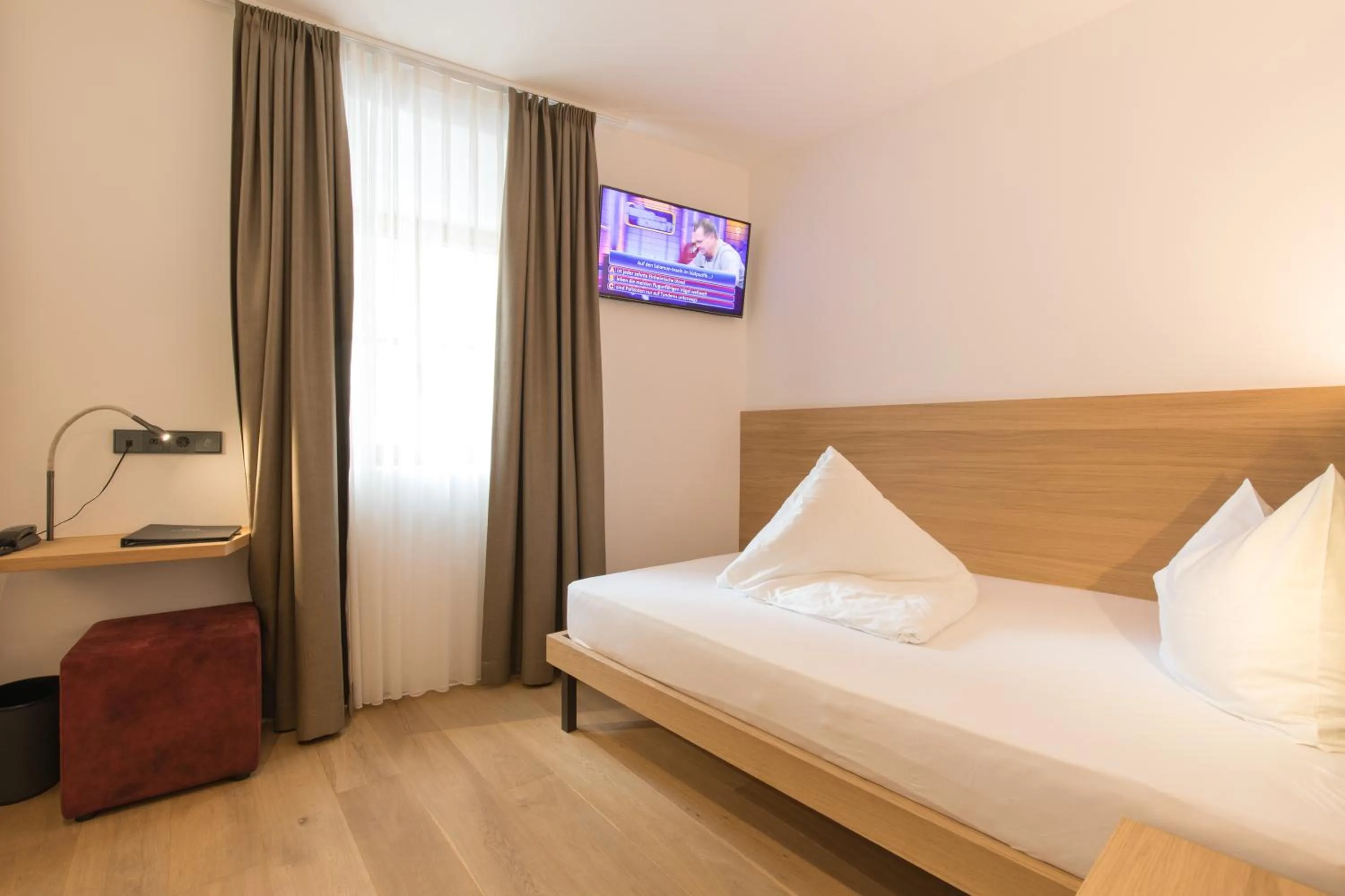 Bed in Belvenu Boutique Hotel