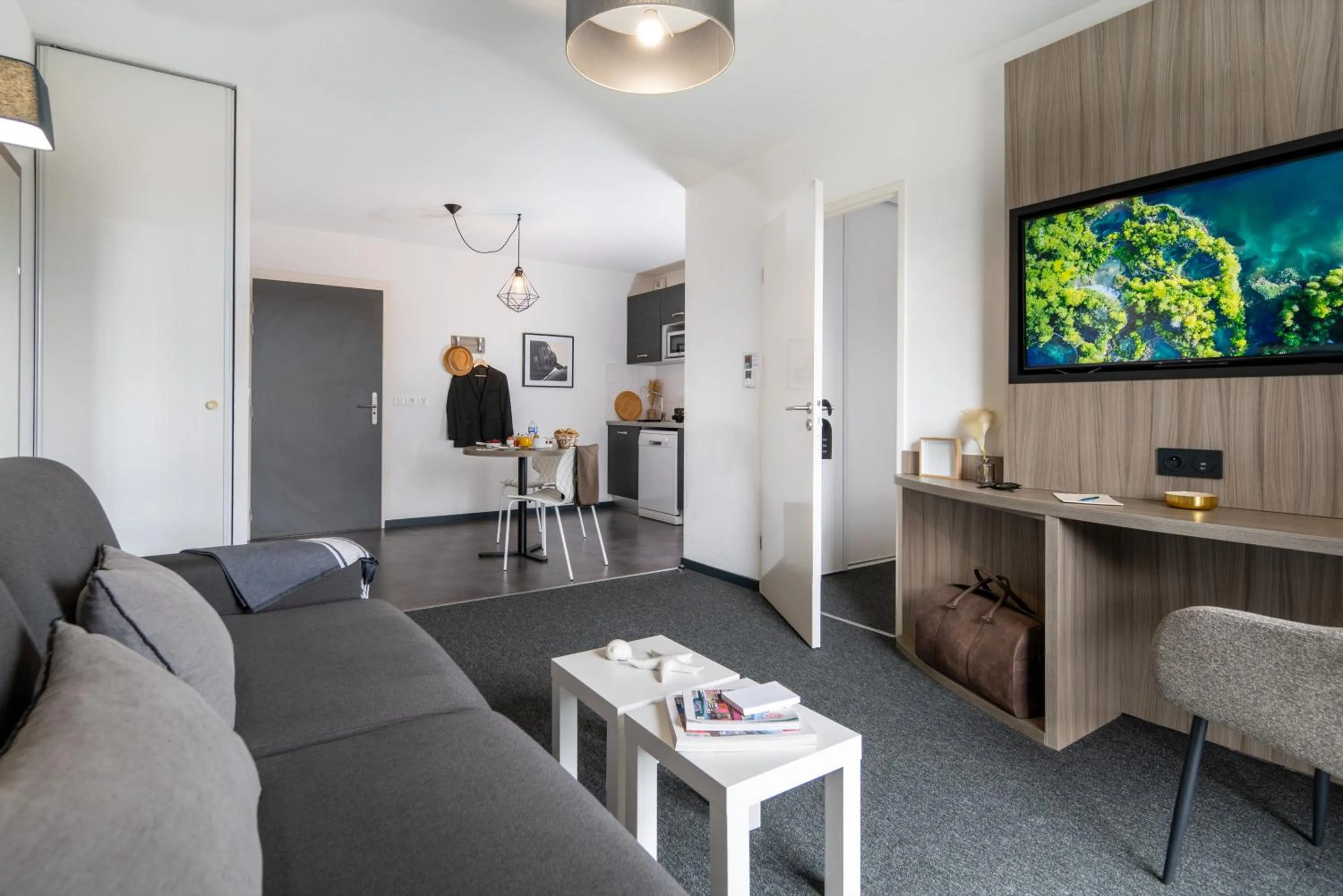 Seating area in Nemea Appart Hotel Stadium Bordeaux aéroport