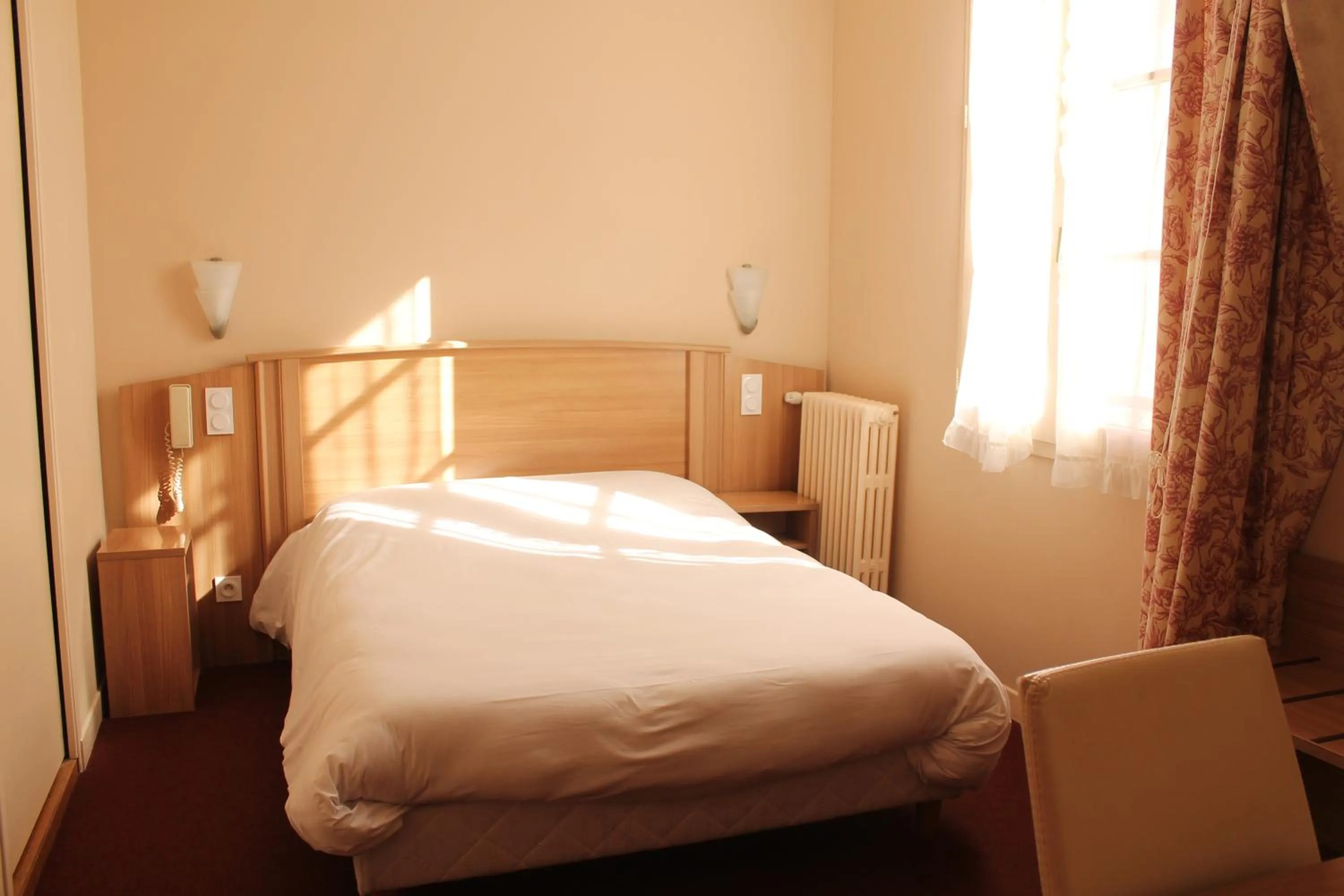 Bed in Hôtel Le Commerce