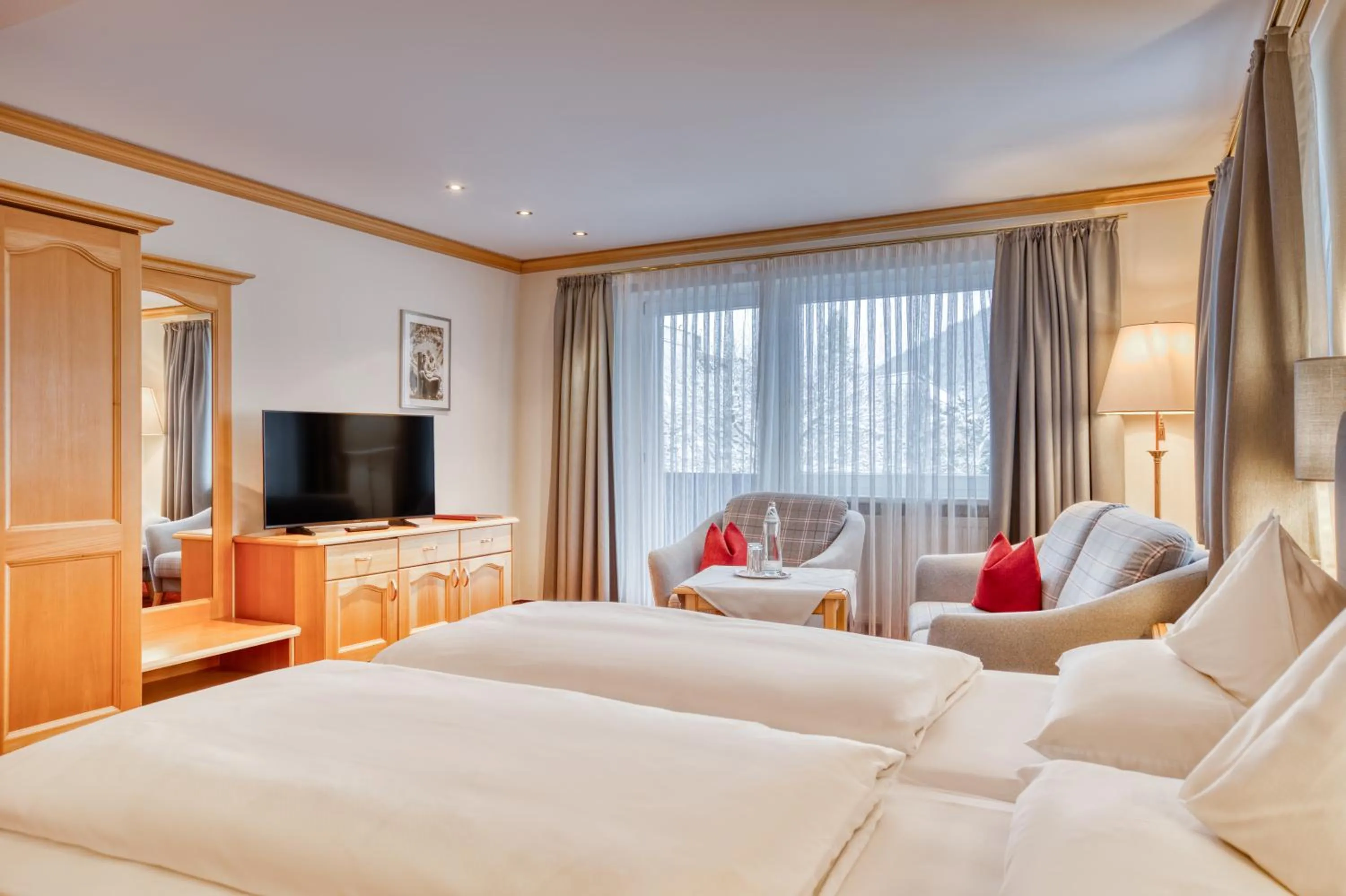 Photo of the whole room, Bed in Parkhotel Seefeld