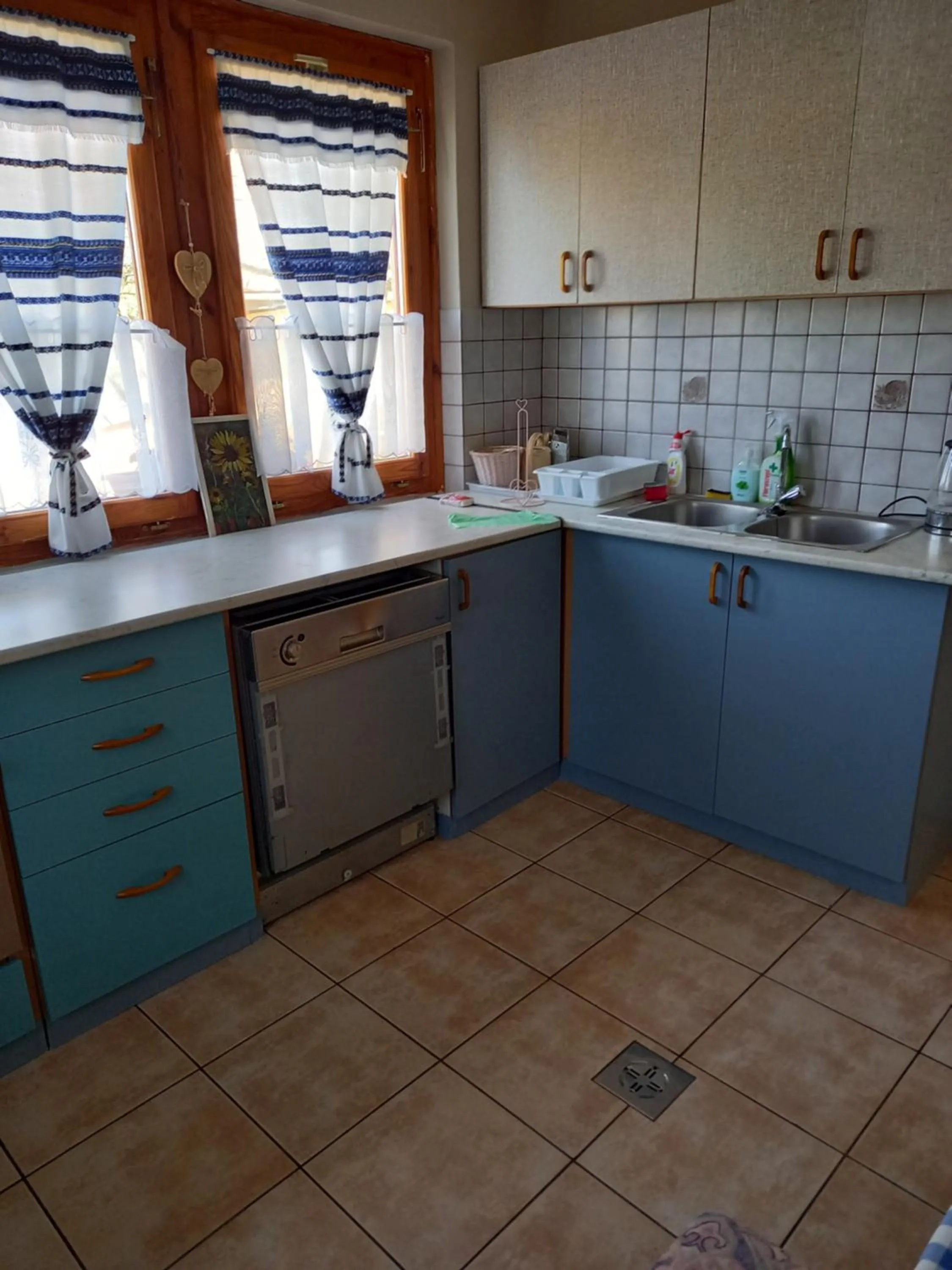Kitchen or kitchenette in Burai Vendégház