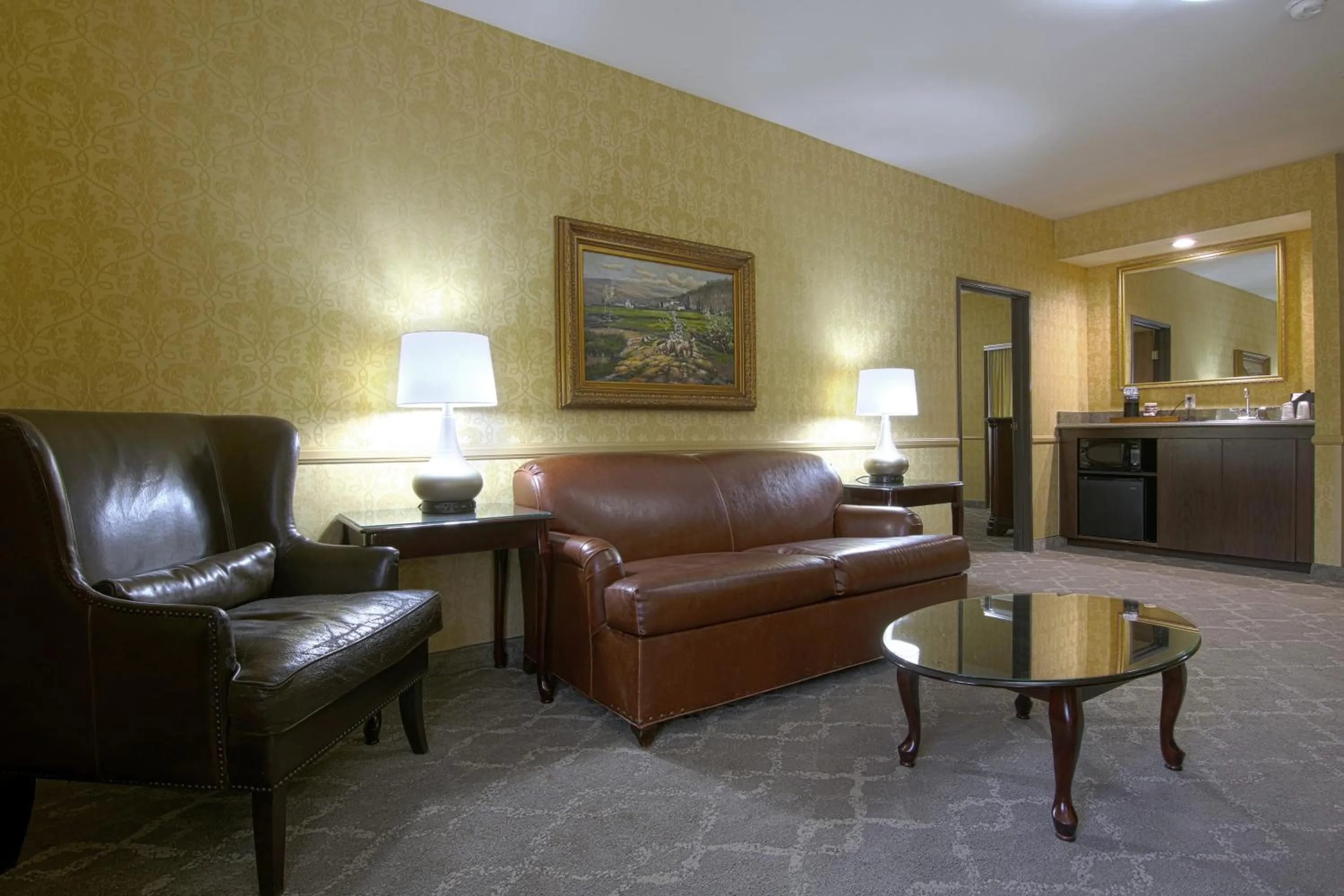 Living room in Azure Hotel&Suites Ontario Trademark Collection by Wyndham