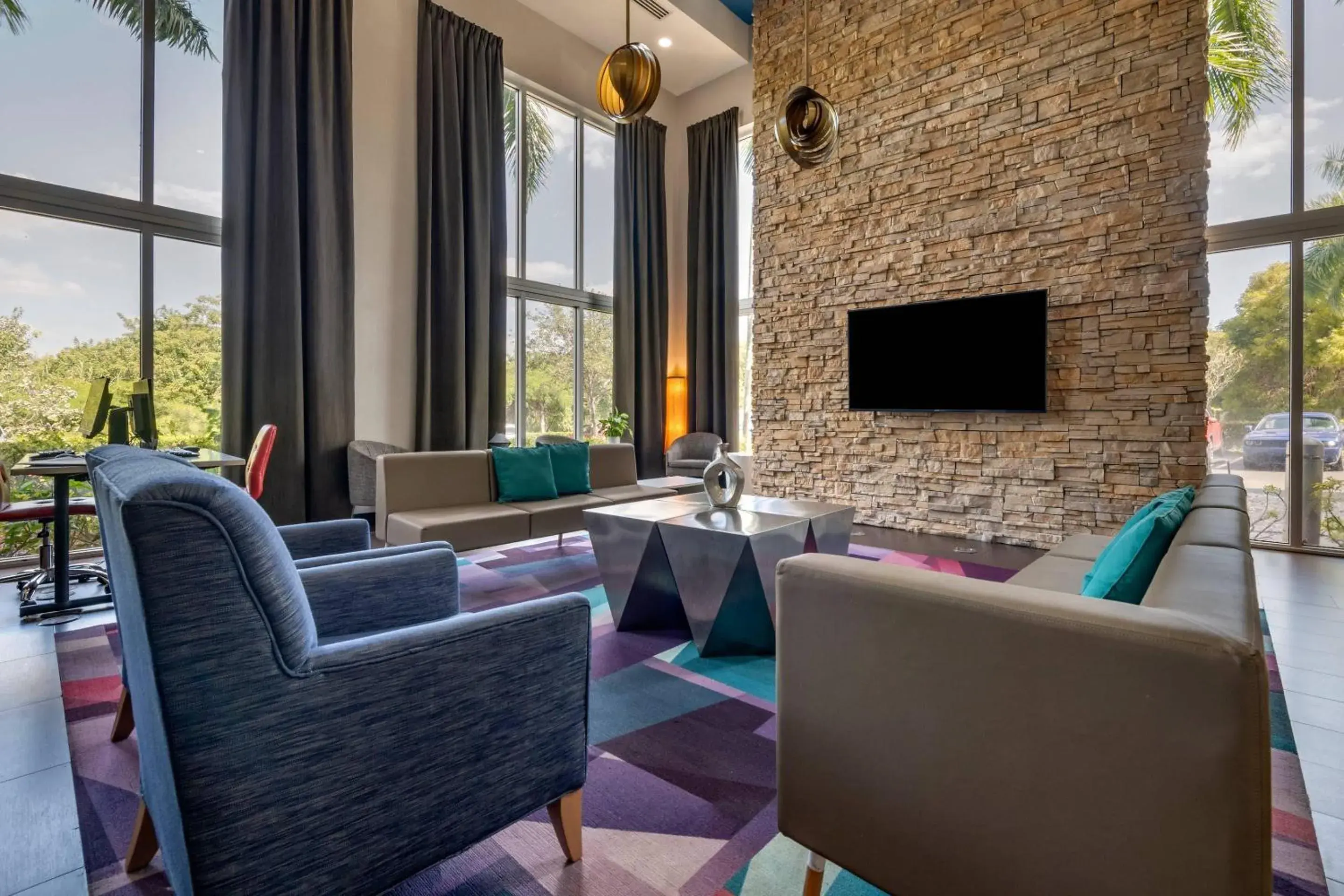 Lobby or reception in Cambria Hotel Ft Lauderdale, Airport South & Cruise Port Lobby or reception in Cambria Hotel Ft Lauderdale, Airport South & Cruise Port