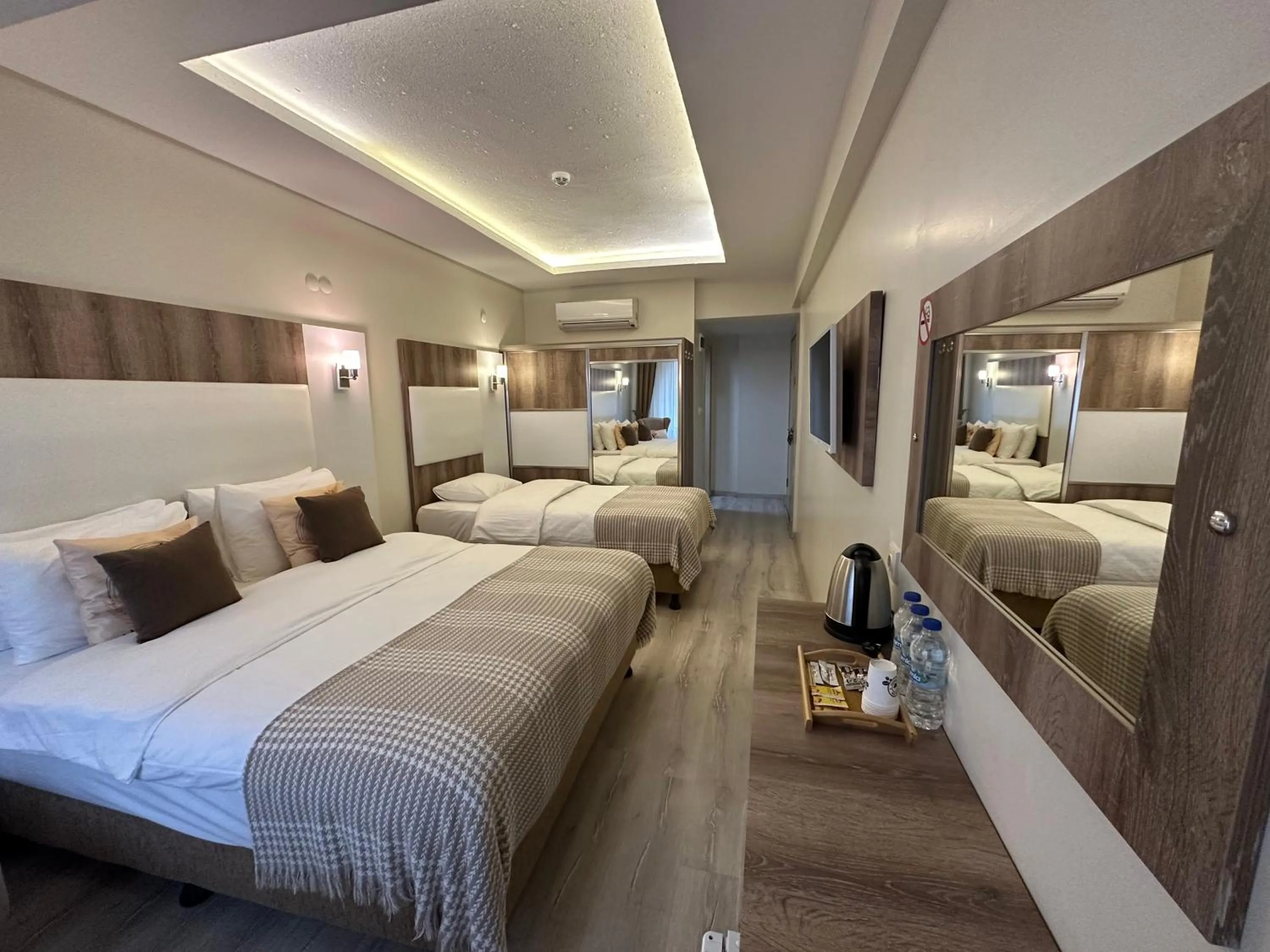 Bed in Line Suite Hotel