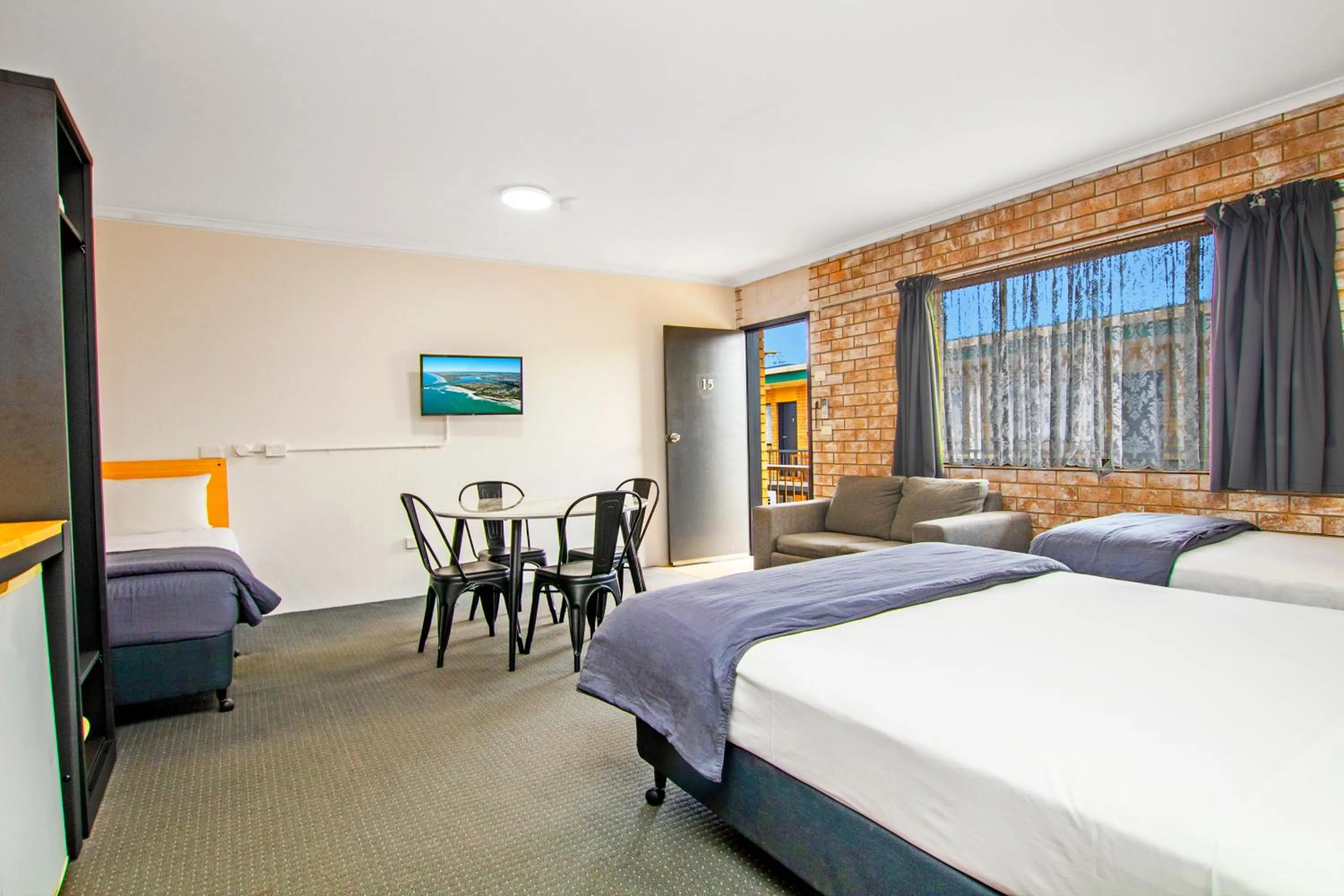 Bed in River Street Motel