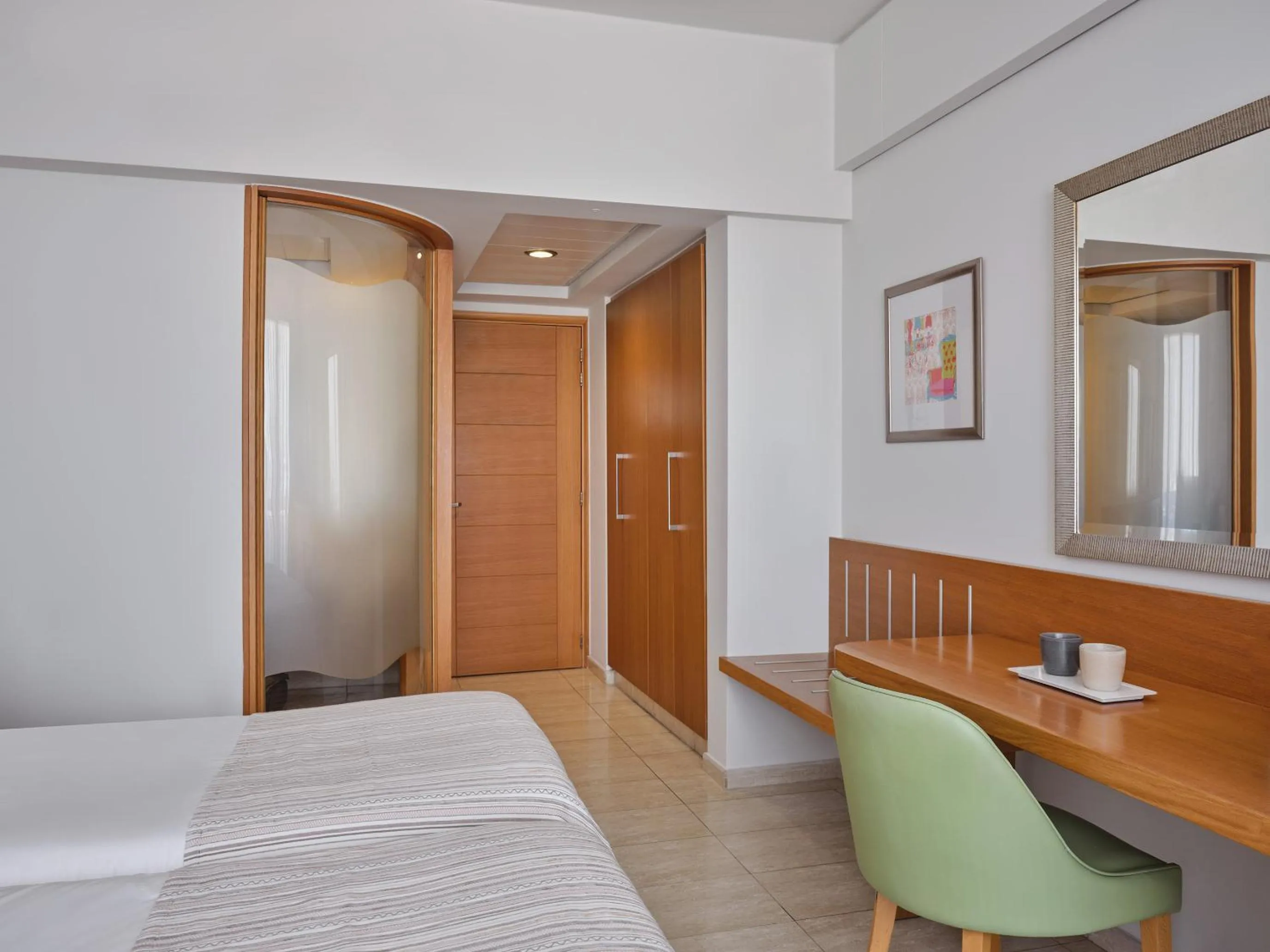 Bed in Atlantica Oasis Hotel