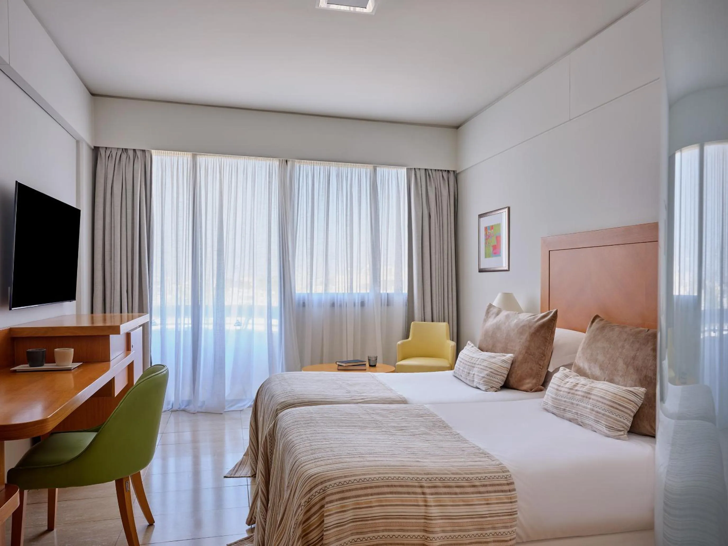 Bed in Atlantica Oasis Hotel