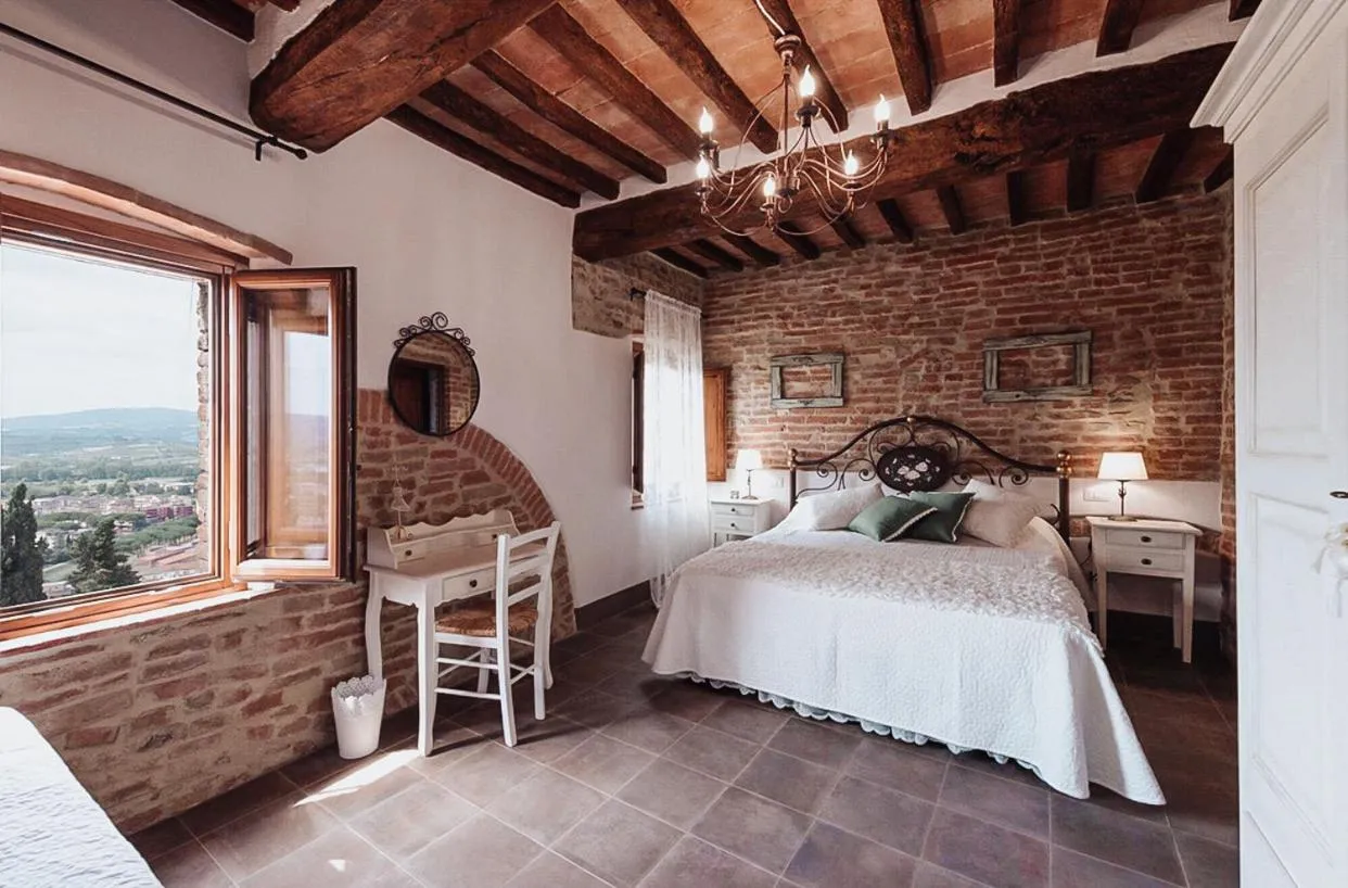 Photo of the whole room, Bed in Antica Torre del Borgo